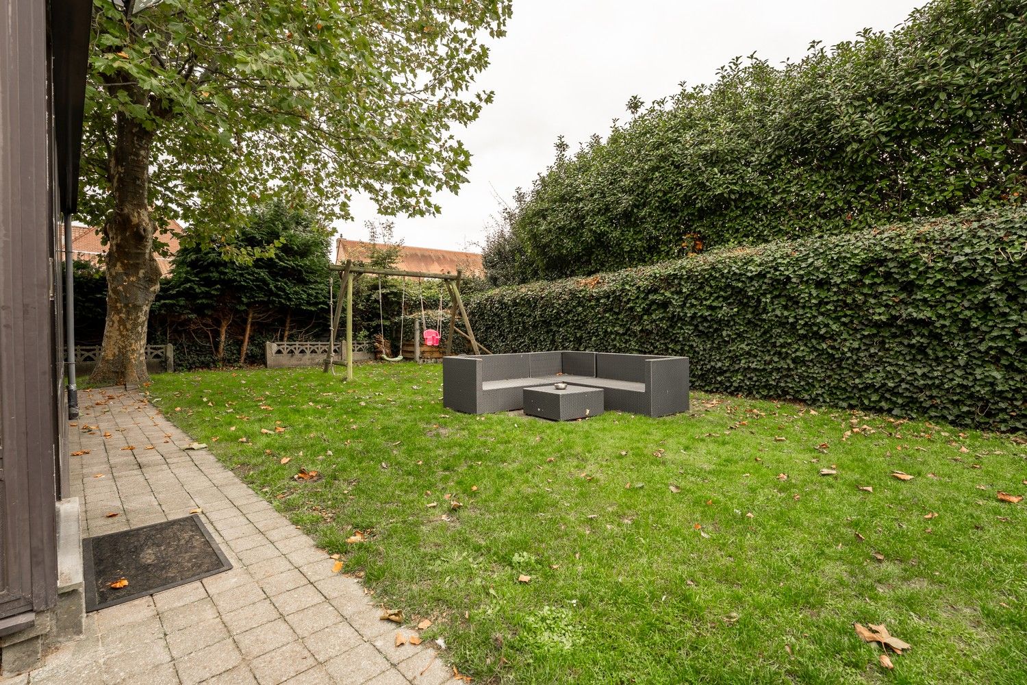 Charmante instapklare gezinswoning met garage op 478 m² grond in hartje Pelt foto 3