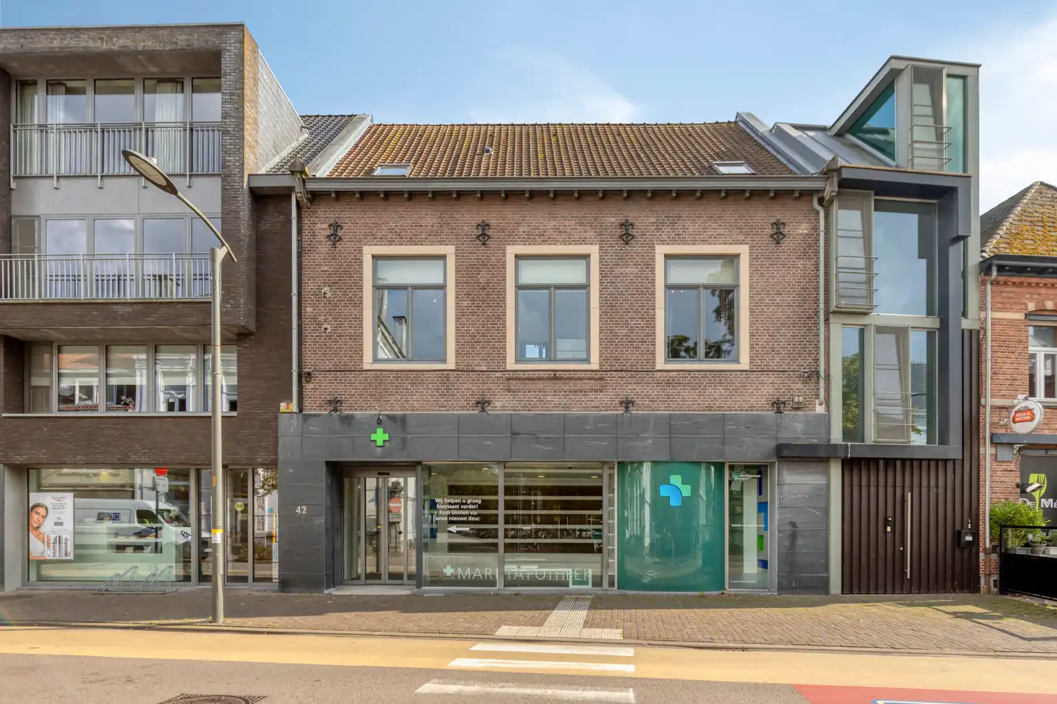 Handelspand met ruime woonst en garage in het centrum foto 39