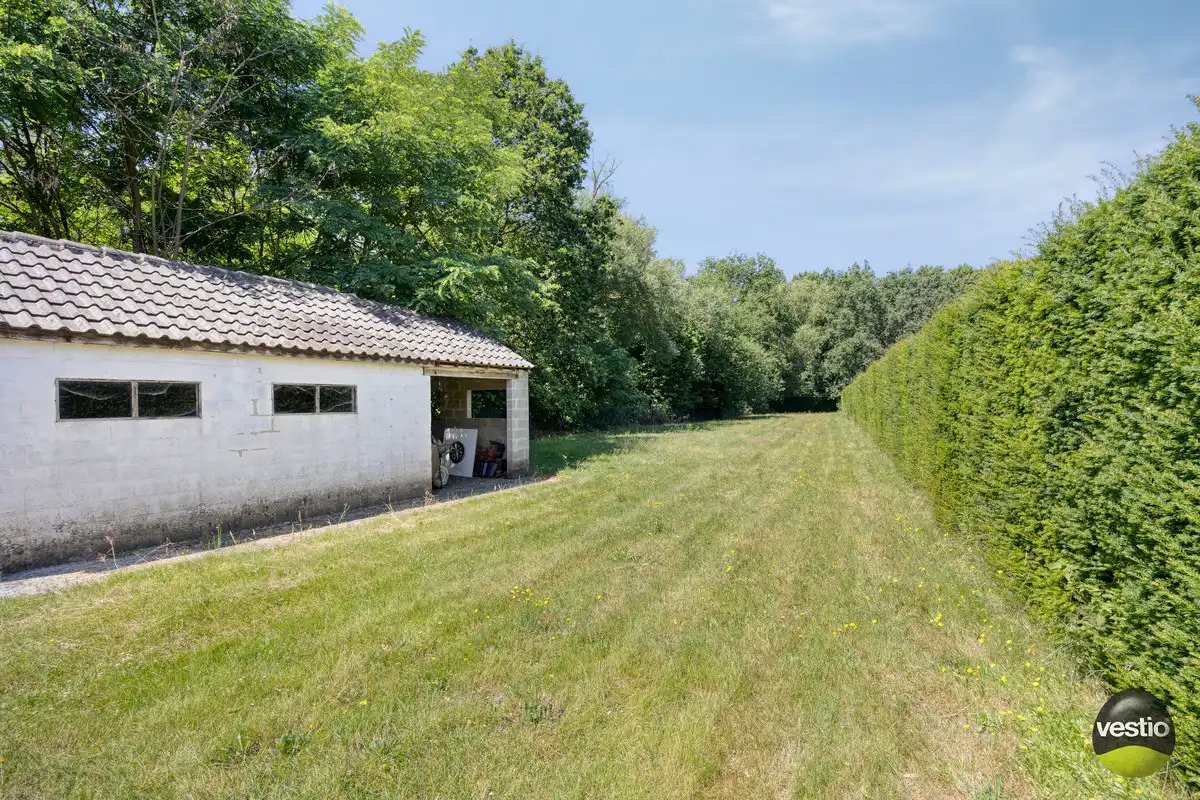 RUSTIG GELEGEN TIJDLOZE WONING MET 4 SLK EN RUIME TUIN. foto 33