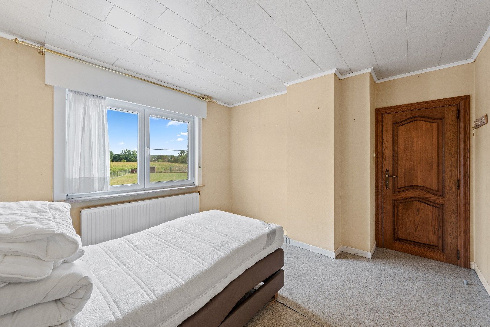 Open bebouwing op topligging met 3 slaapkamers en prachtige tuin foto 14