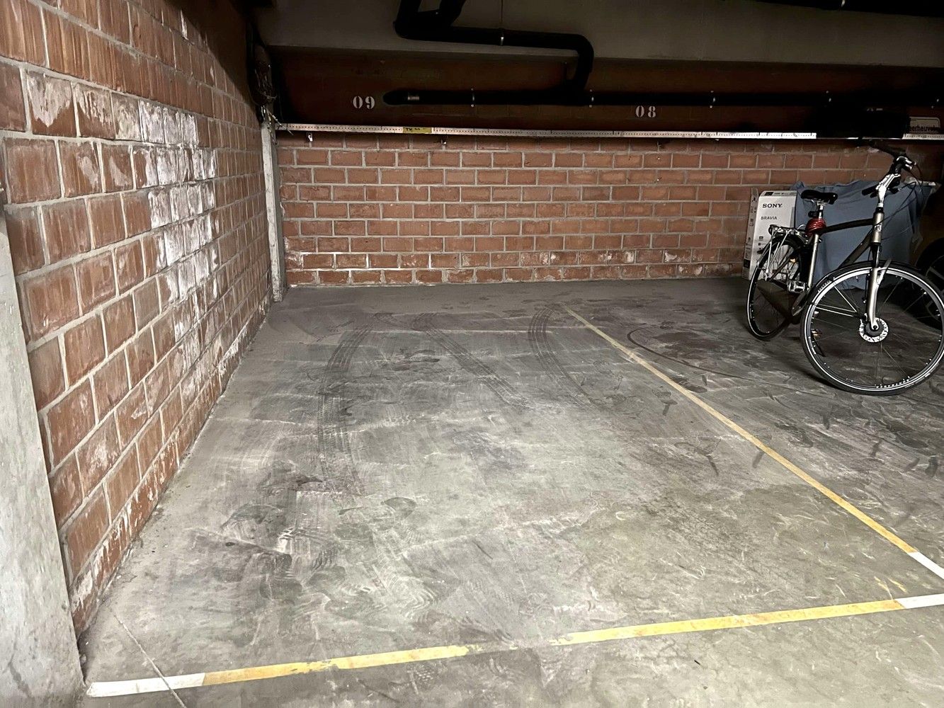 Overdekte, afgelijnde parkeerplaats te koop in centrum Leuven foto 2