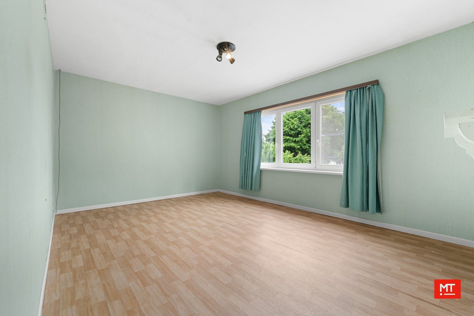 Op te frissen woning met 2 slpk (+ mogelijk), tuin en garage in het landelijke Mesen foto 8