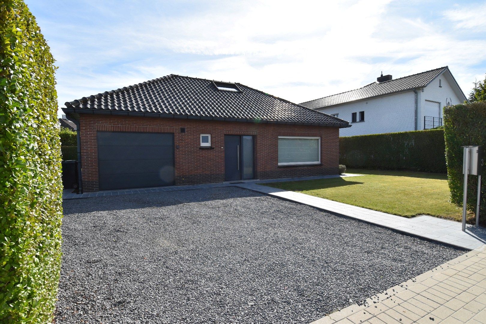 Villa met 3 slaapkamers, garage en zuidoost georiënteerde tuin in Marke foto {{pictureIndex}}