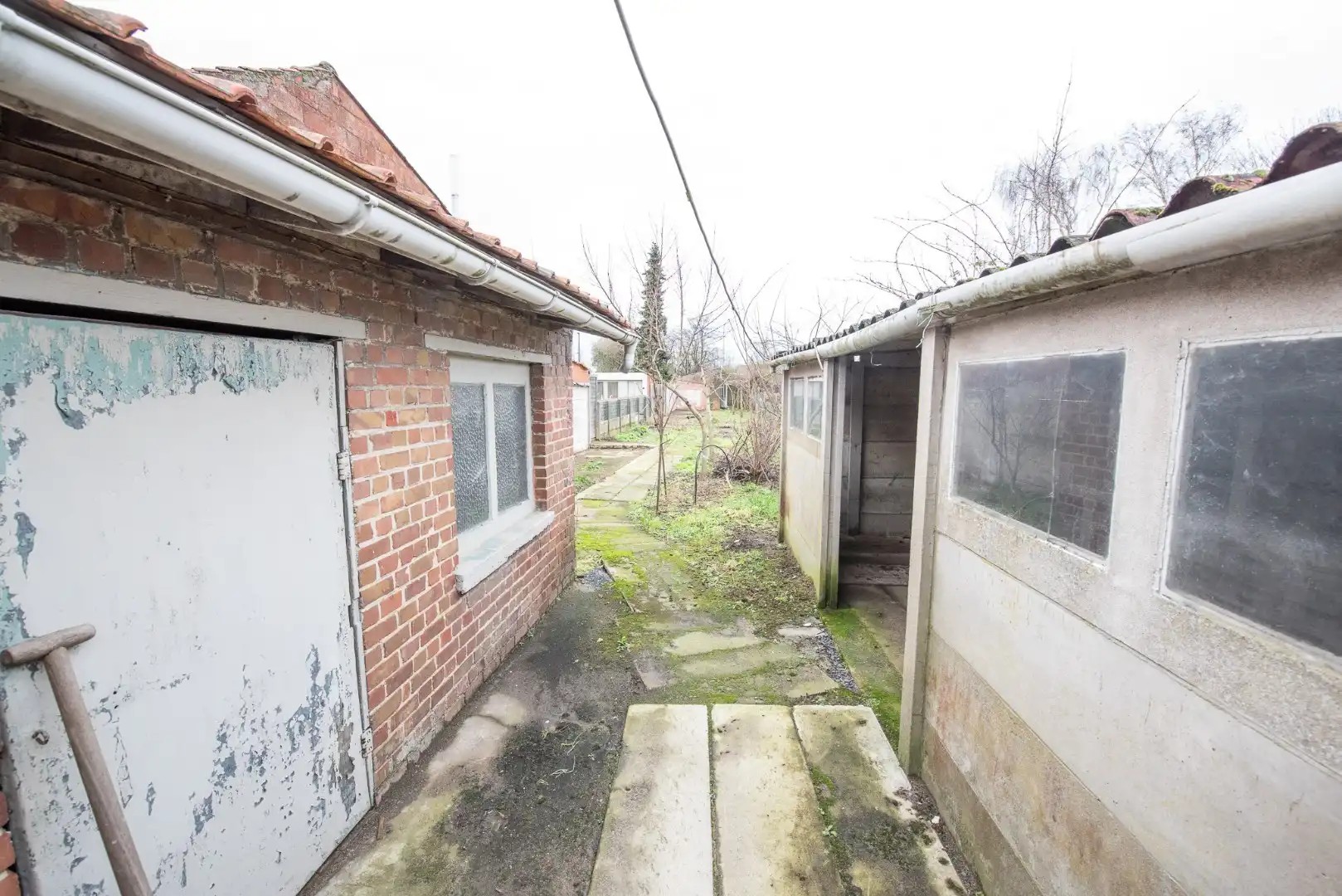 Te koop in Waregem – Halfopen bebouwing met renovatiepotentieel! foto 15