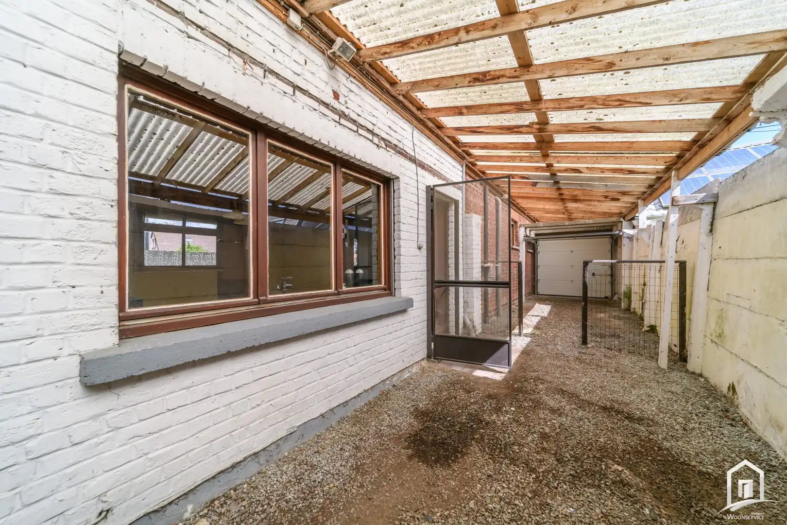 Te renoveren gezinswoning met 2 slaapkamers en ruime tuin foto 14