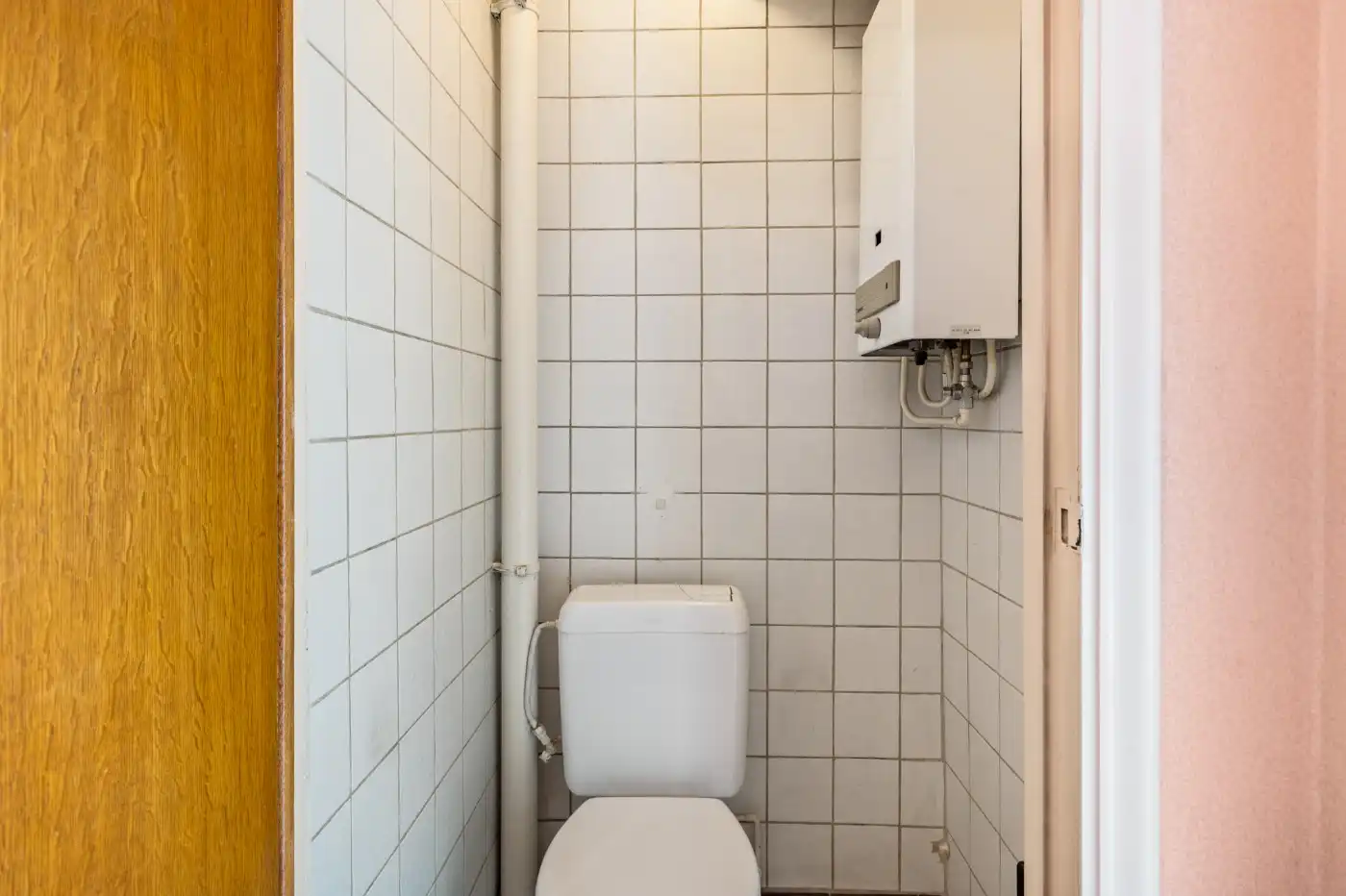 Te renoveren woning met 2 slpk., dubbele garage en tuin foto 14