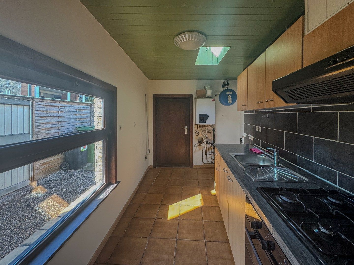 Hoekwoning met 2 slaapkamers en koertje. foto 4
