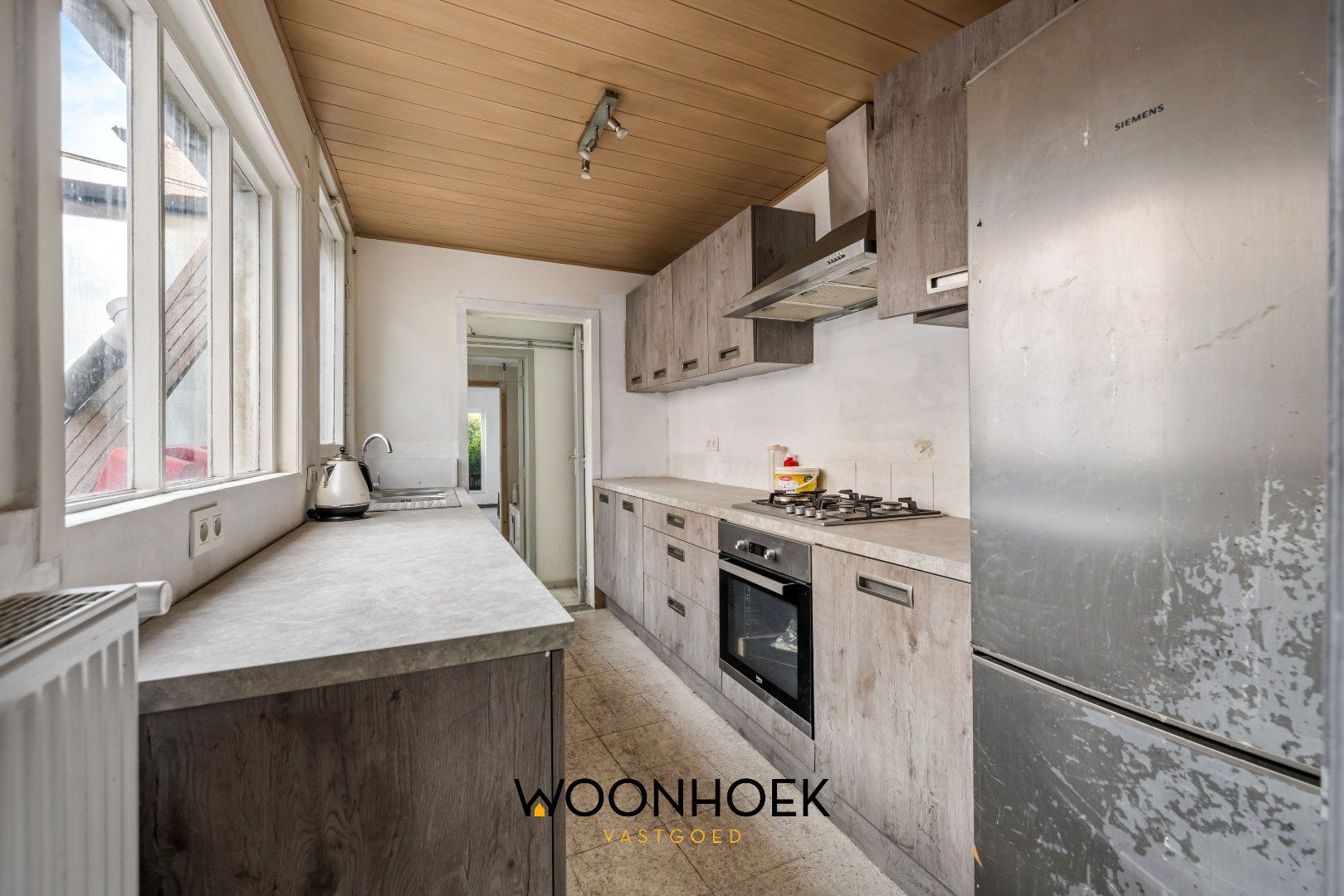Te renoveren woning in centrum Overmere foto 4