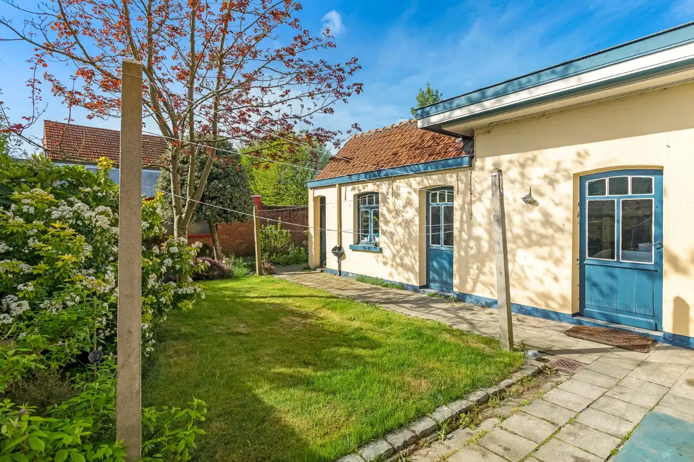 Te renoveren, geklasseerde art deco woning met 3 slpk, ruime zolder en Z-tuin foto 26