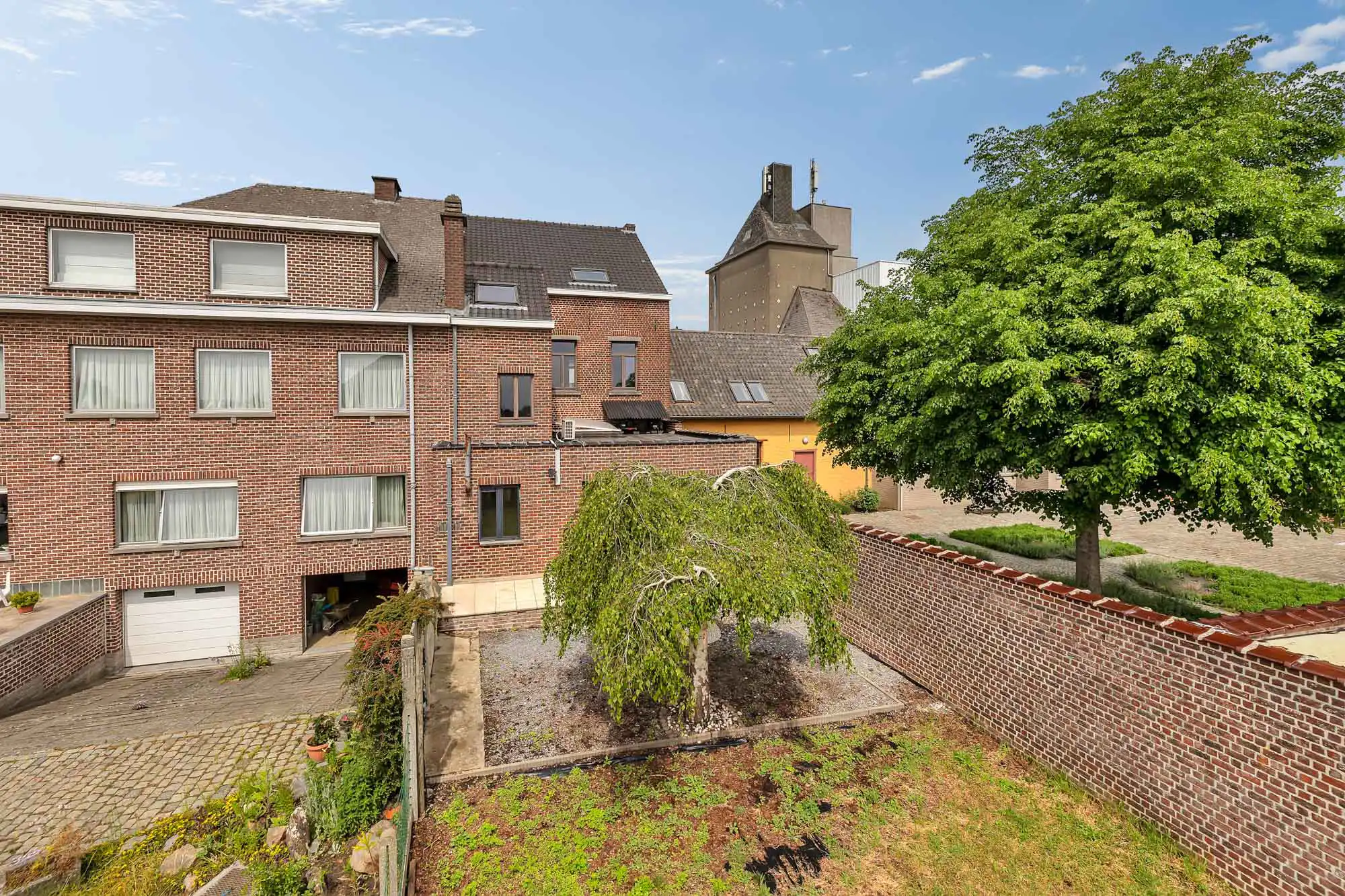 Handelshuis met commercieel gkvls en app met 3 slpks en tuin foto 2