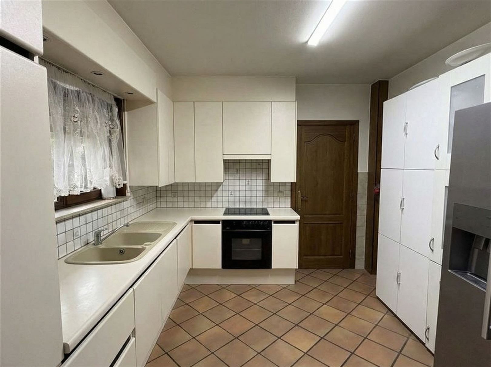 Woning centrum Stekene met mooie tuin foto 6