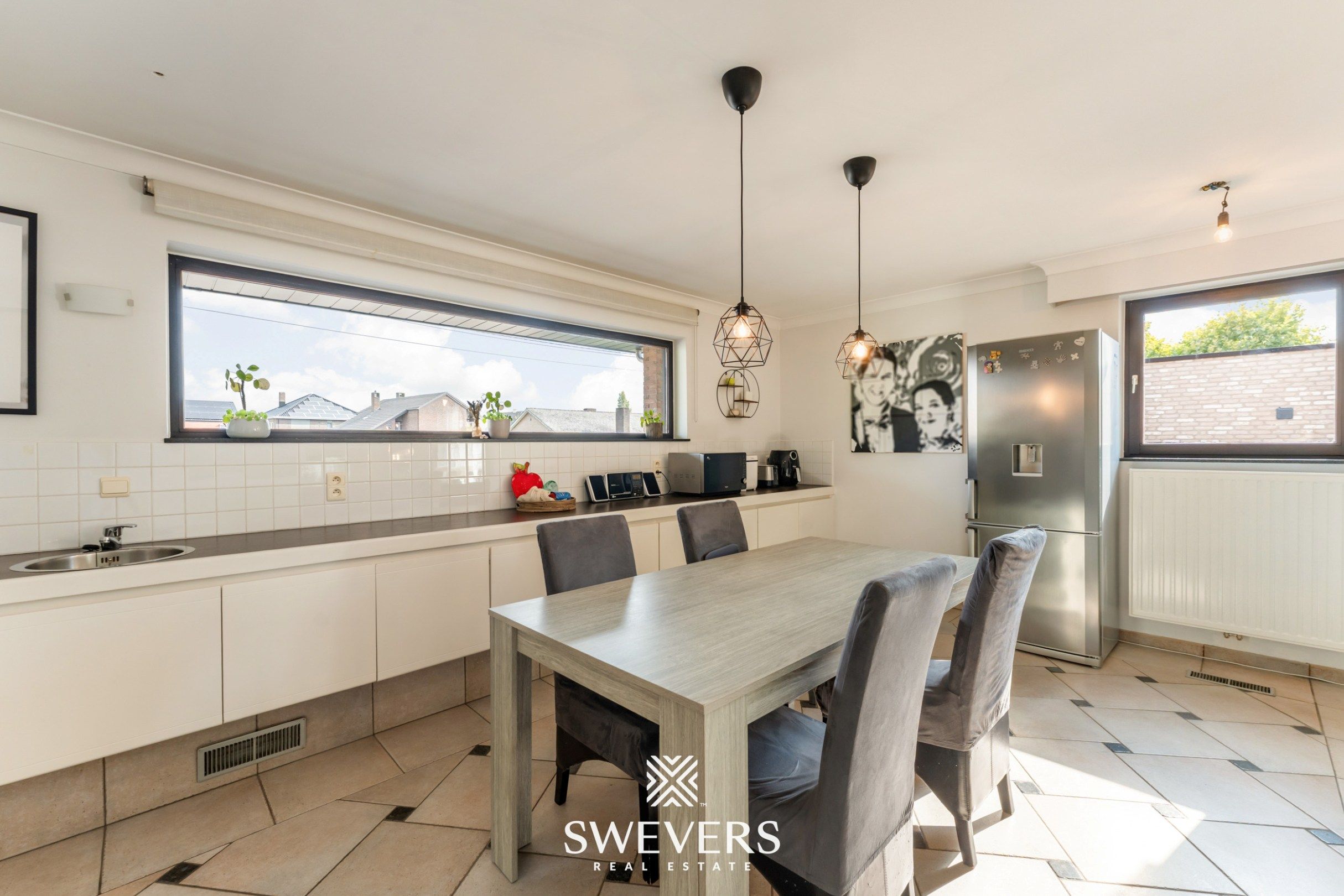 Knusse, hedendaagse gezinswoning met warme indeling en grote, zonnige tuin foto 16