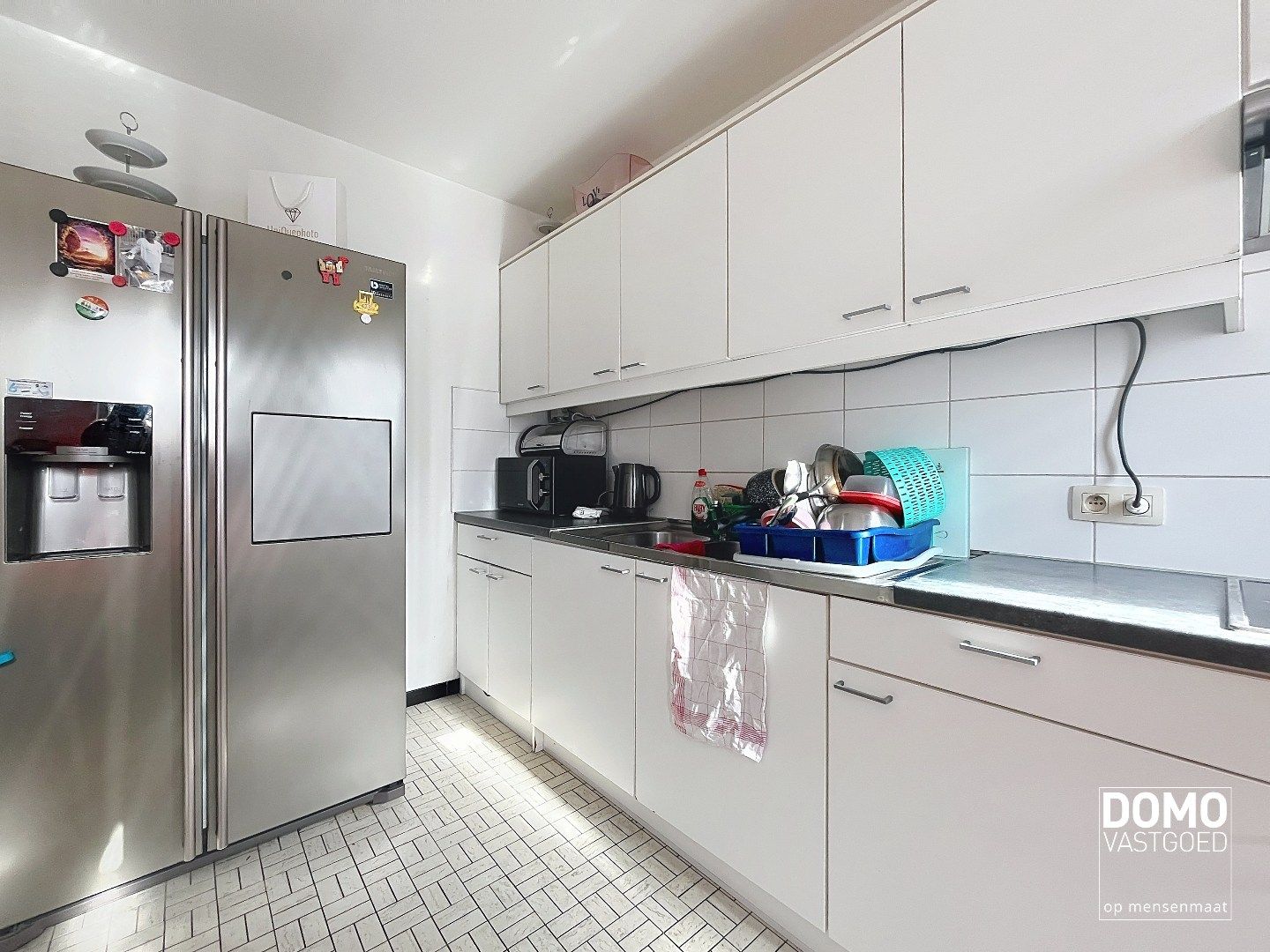 GELIJKVLOERS APPARTEMENT MET 2 SLAAPKAMERS EN GARAGE GELEGEN IN HET CENTRUM VAN BERINGEN foto 4