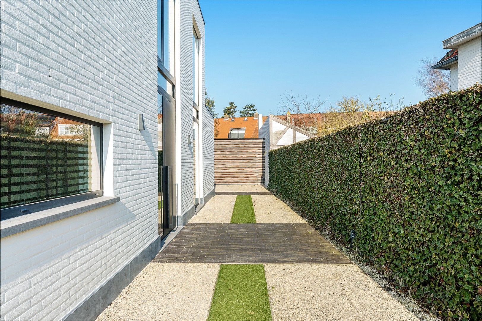 Hedendaagse, recente koppelwoonst centraal gelegen te oud-Knokke. foto 16