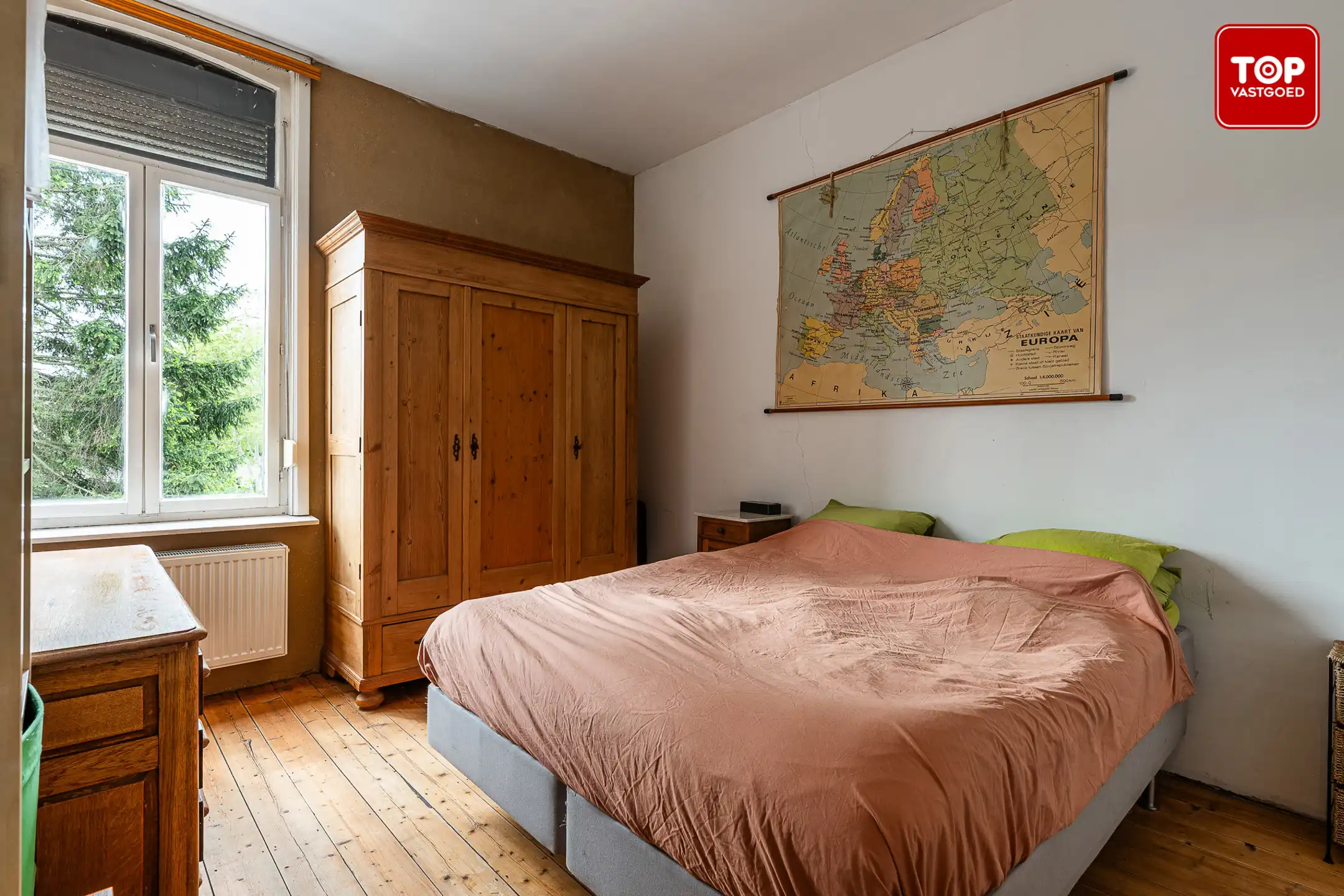 Woning met 3 slaapkamers en leuke tuin op toplocatie. foto 17