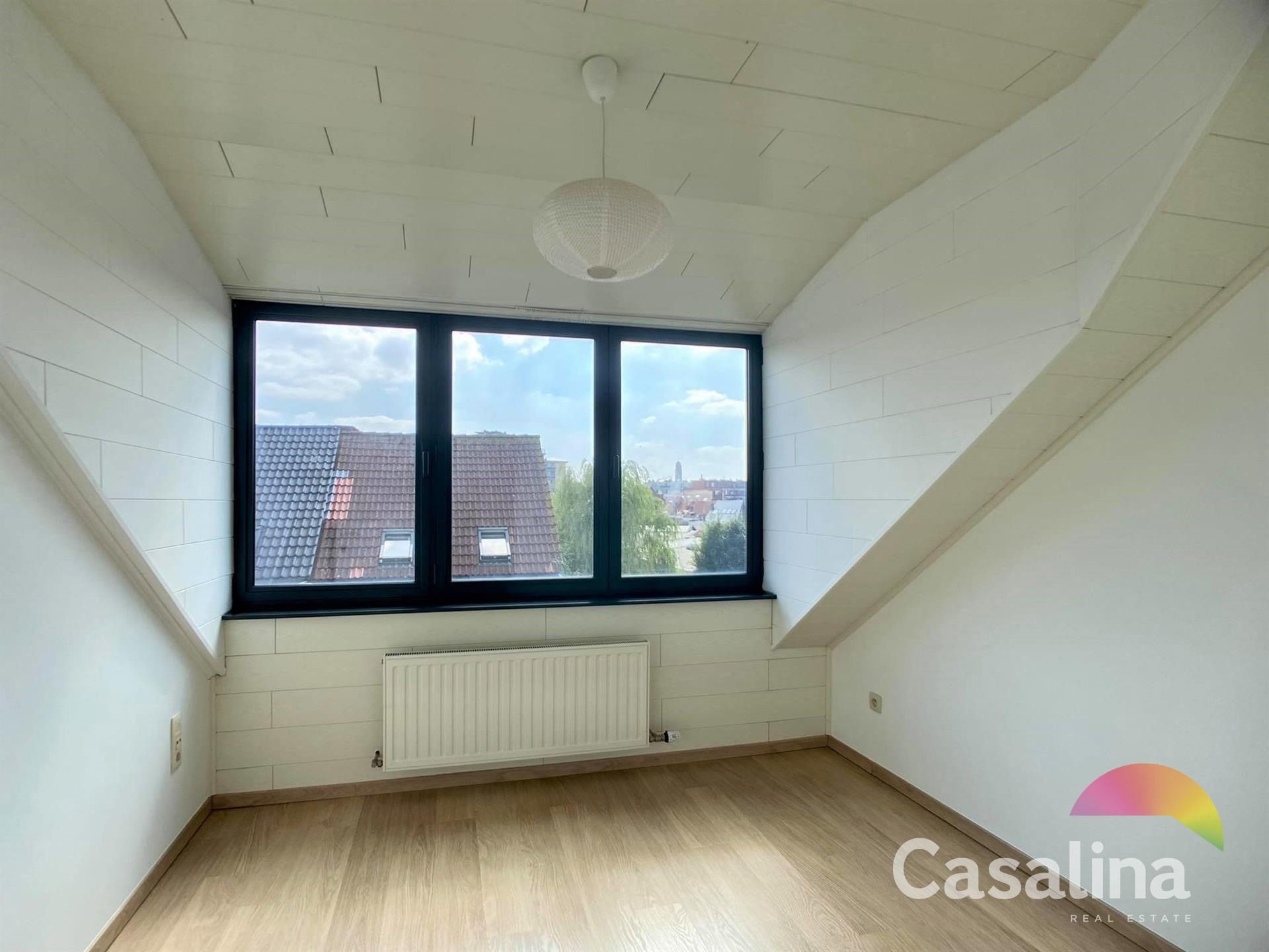 Moderne duplex 95m² met terras, parking en kelder foto 26