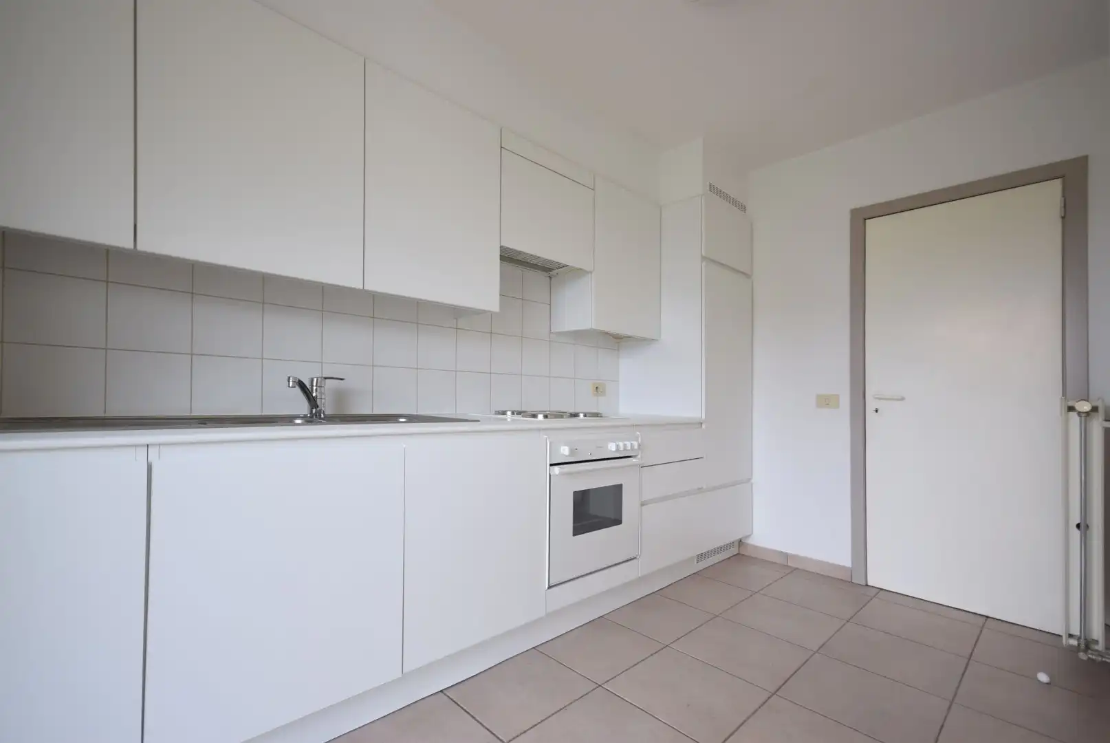 Ruim appartement met 2 slaapkamers en terras in residentie Helminge foto 4