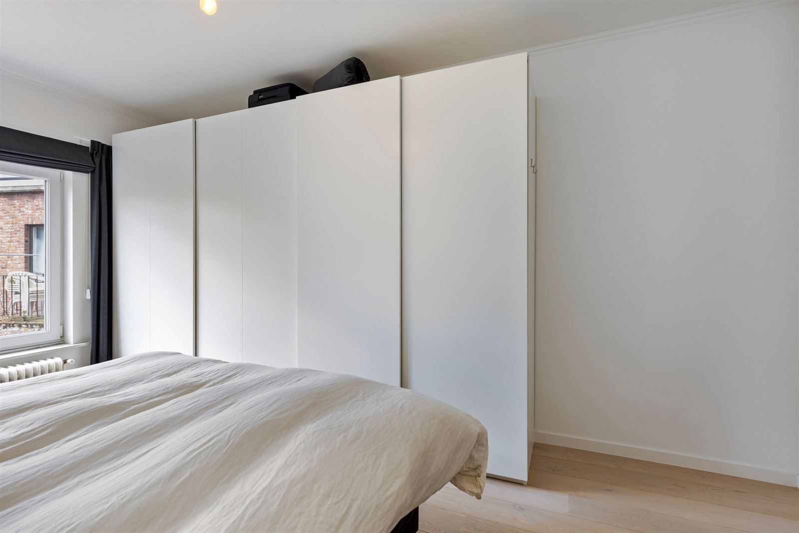 Modern gerenoveerd 2 slaapkamer appart. foto 11