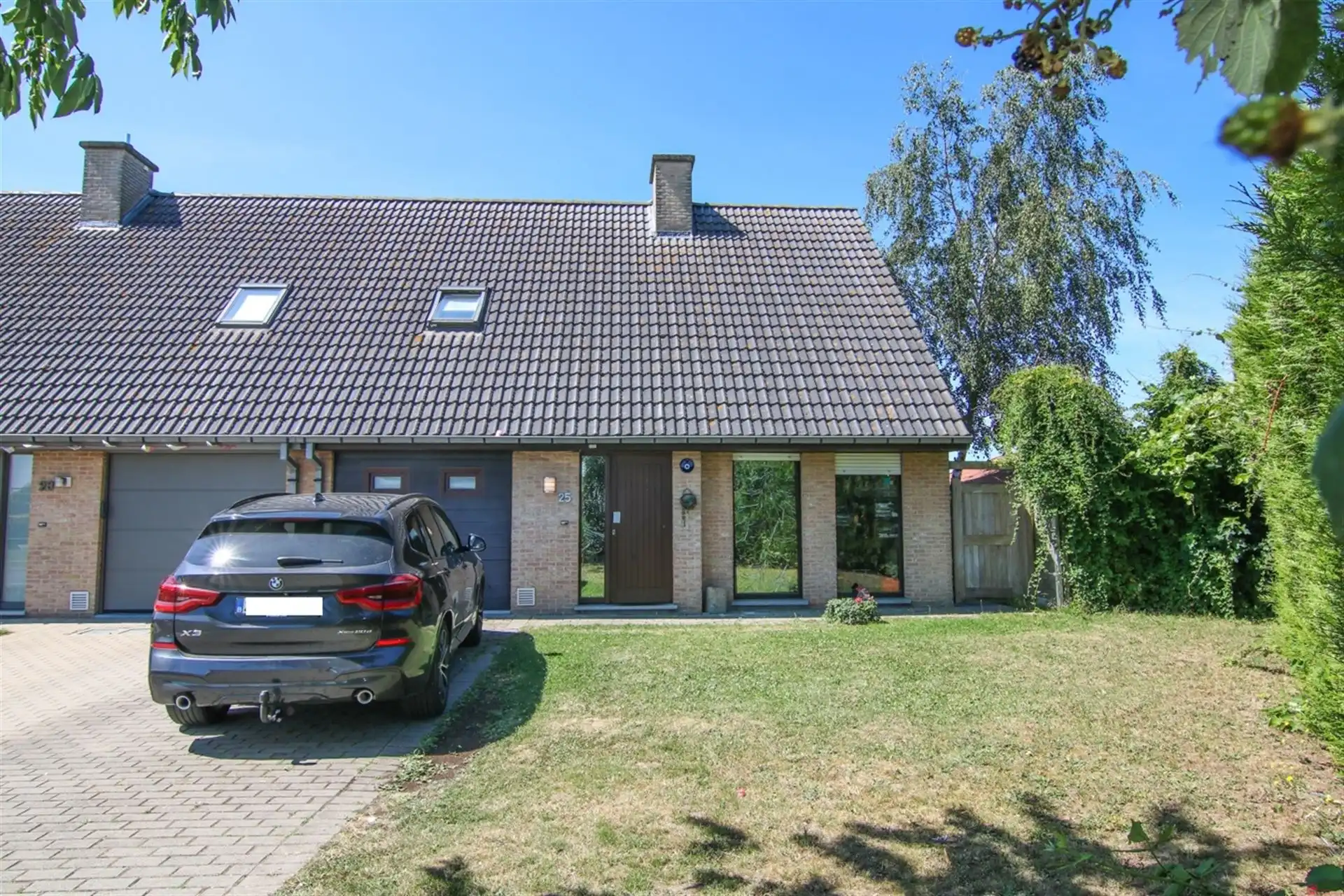 Hoofdfoto van de publicatie: Halfopen woning met in groene wijk