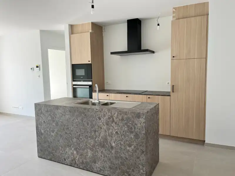 App met 2  slpkm, garage en kelderberging foto 7