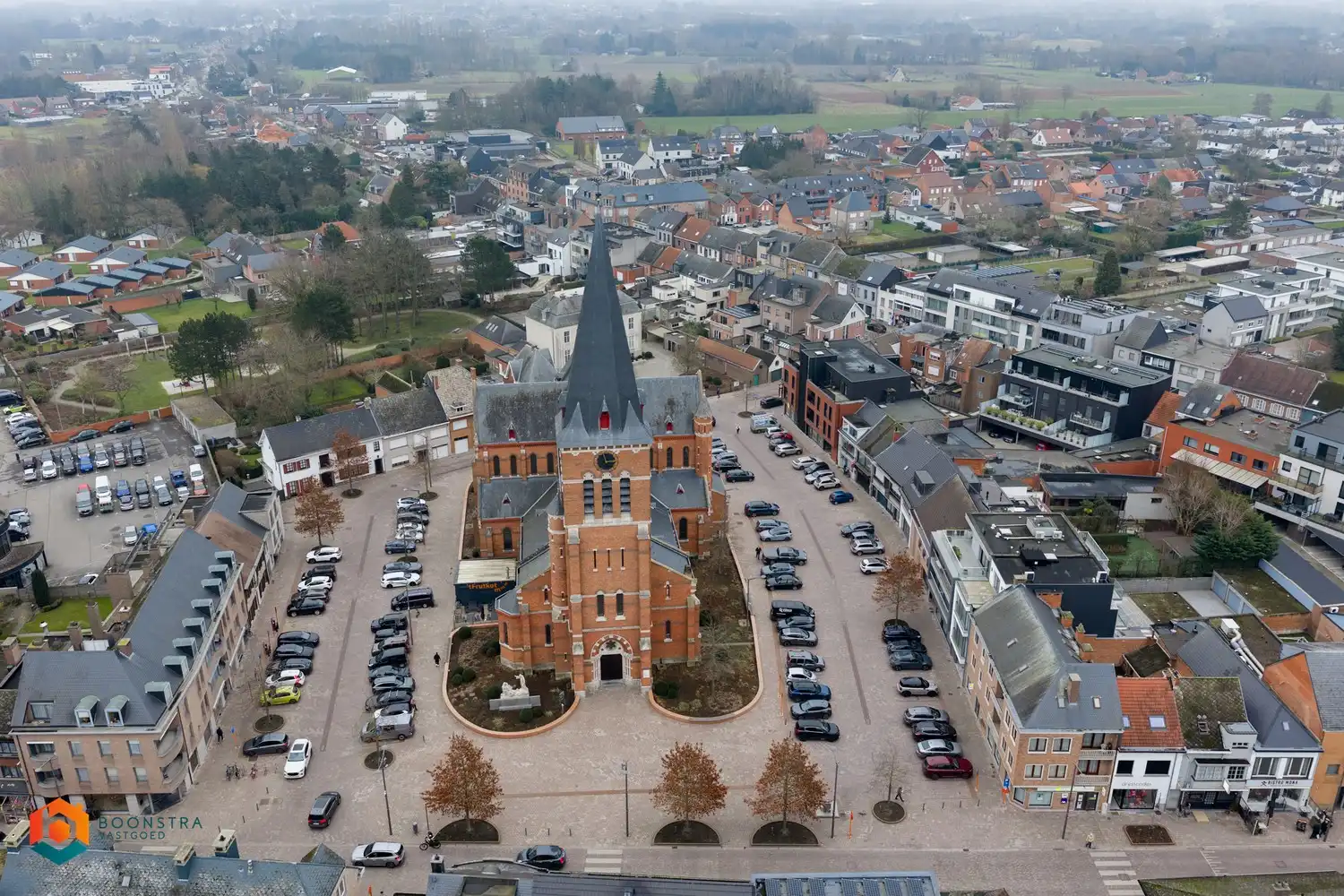 Handelspand met bovengelegen woonst pal in het centrum van Putte! foto 24