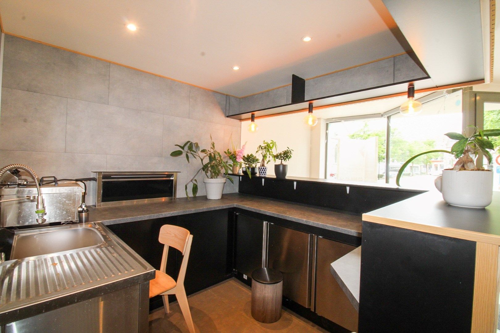 Veelzijdig handelshuis met woonst en luxueuze B&B op toplocatie aan de Markt van Temse! foto 7