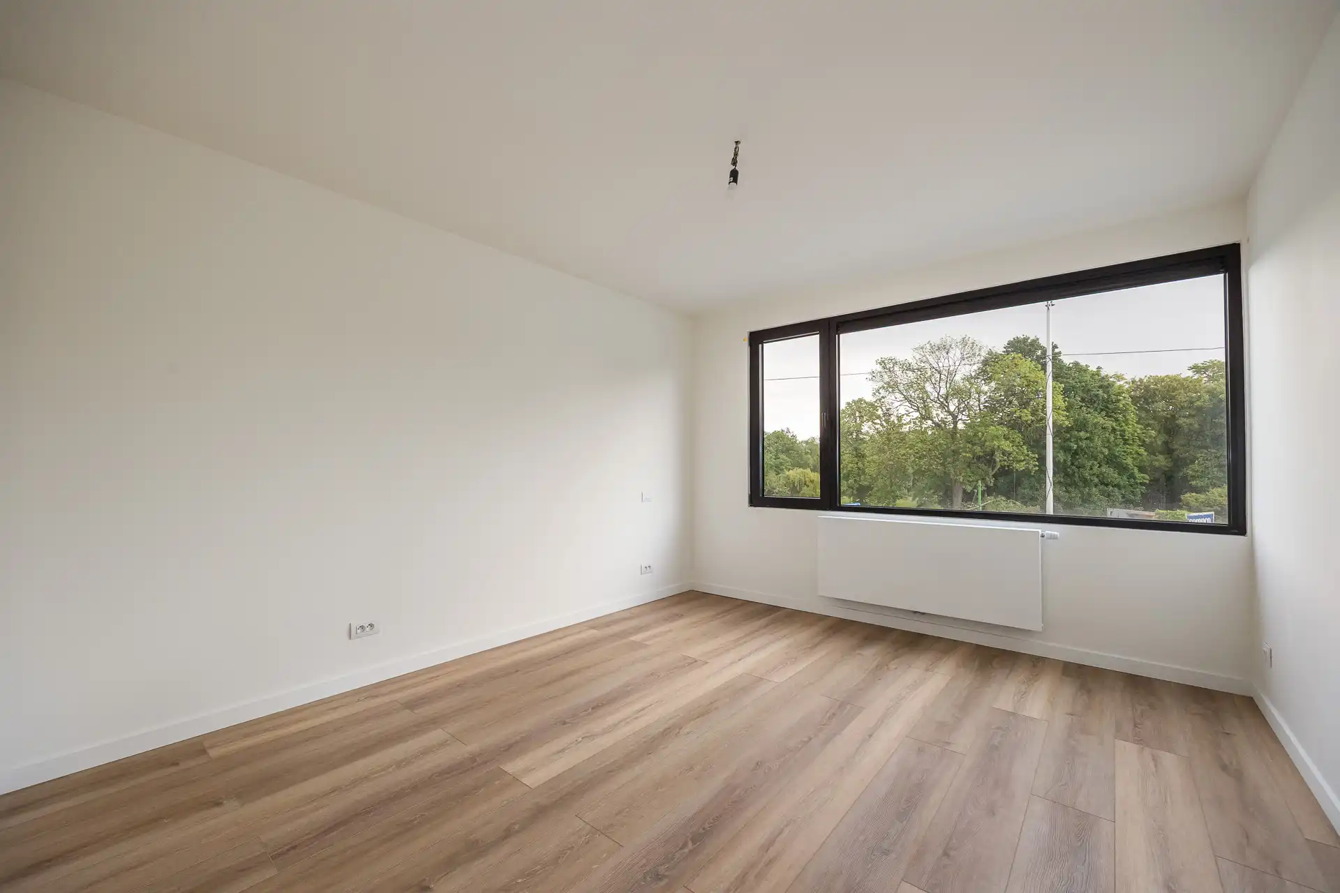 Ruim kwalitatief gerenoveerd 2 slpkappartement met ZW-terras foto 7