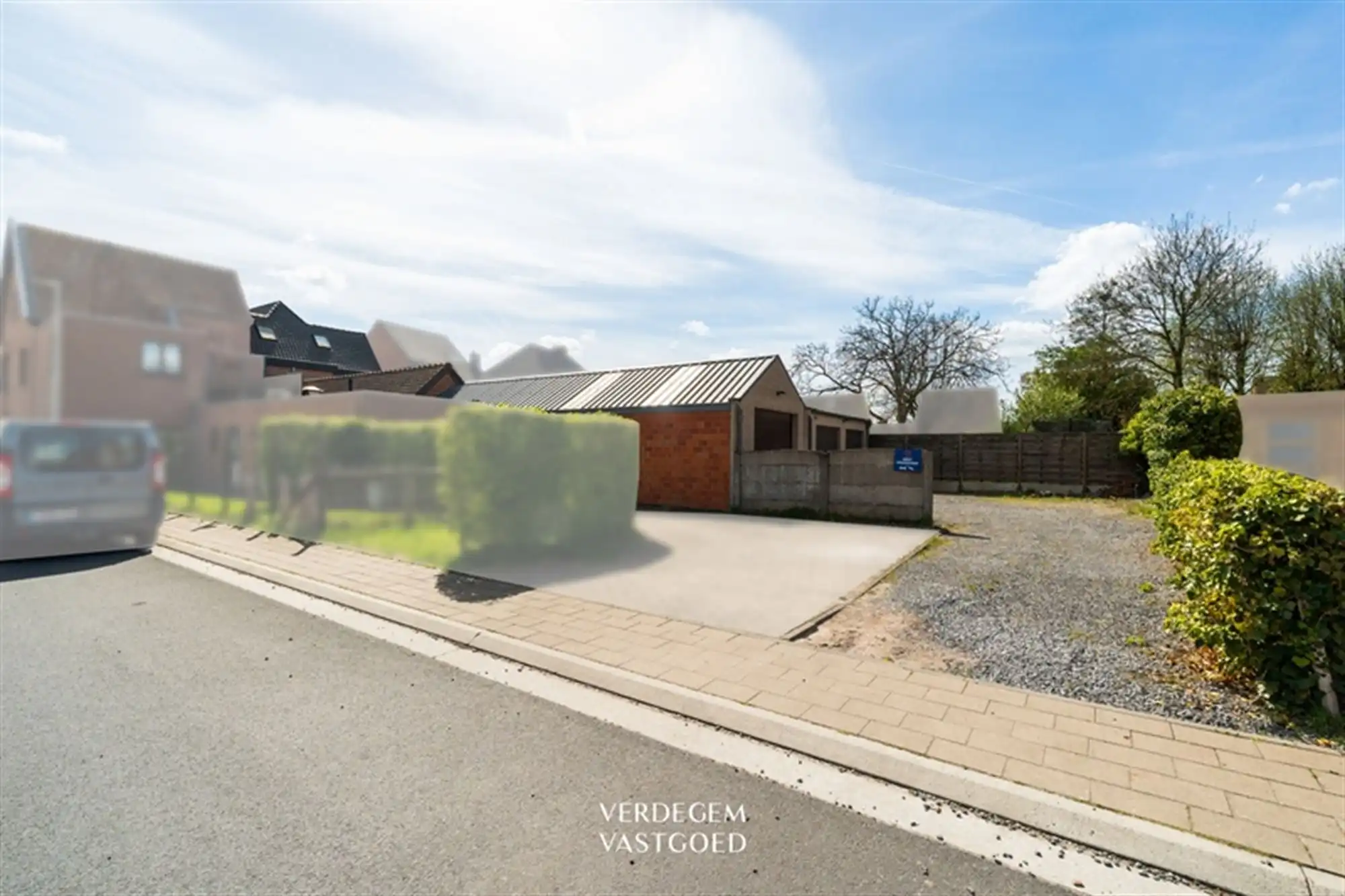 Opbrengsteigendom met 2 appartementen en 4 garages in het centrum van Sleidinge  foto 3