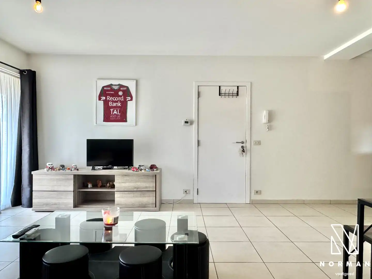 Gelijkvloers, instapklaar 2-slaapkamer appartement te koop met terras in centrum Bavikhove! foto 8