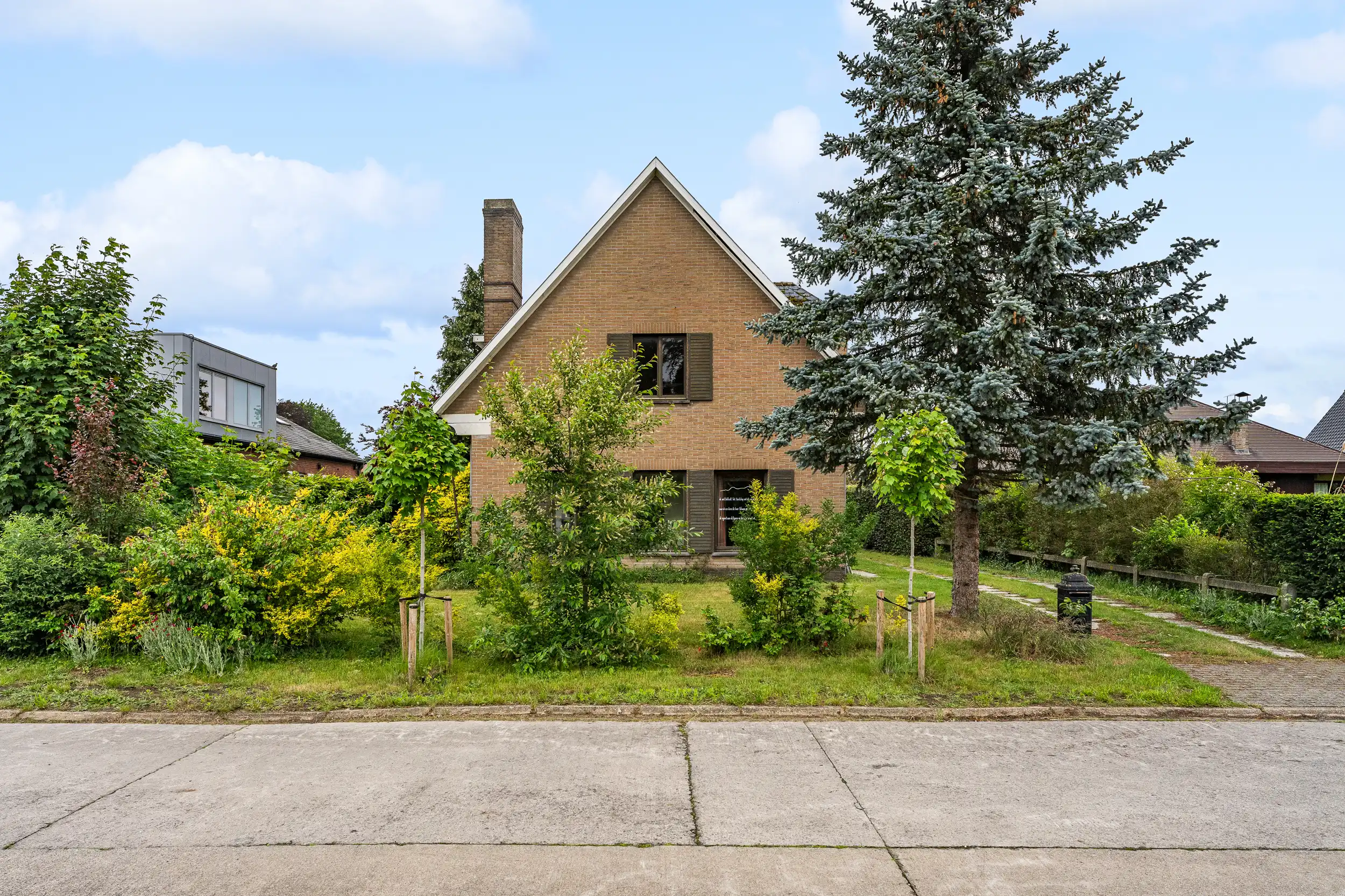 Te renoveren woning in residentiële woonwijk te Wetteren foto 2