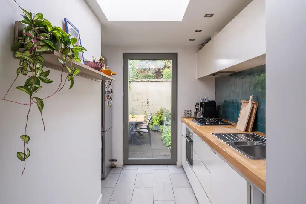 Charmante rijwoning met drie slaapkamers en een geborgen, gezellige buitenruimte foto 5