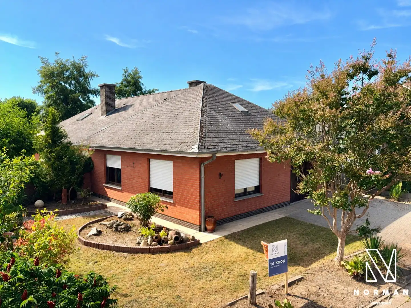 Alleenstaande bungalowwoning met 3 slaapkamers, tuin en garage te koop in rustige woonwijk te Kuurne! foto 2