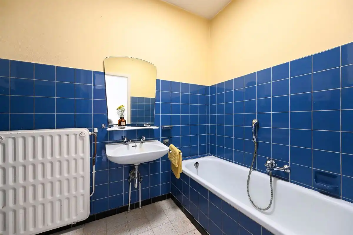 Lichtrijk te renoveren hoekappartement in hartje Brasschaat foto 15