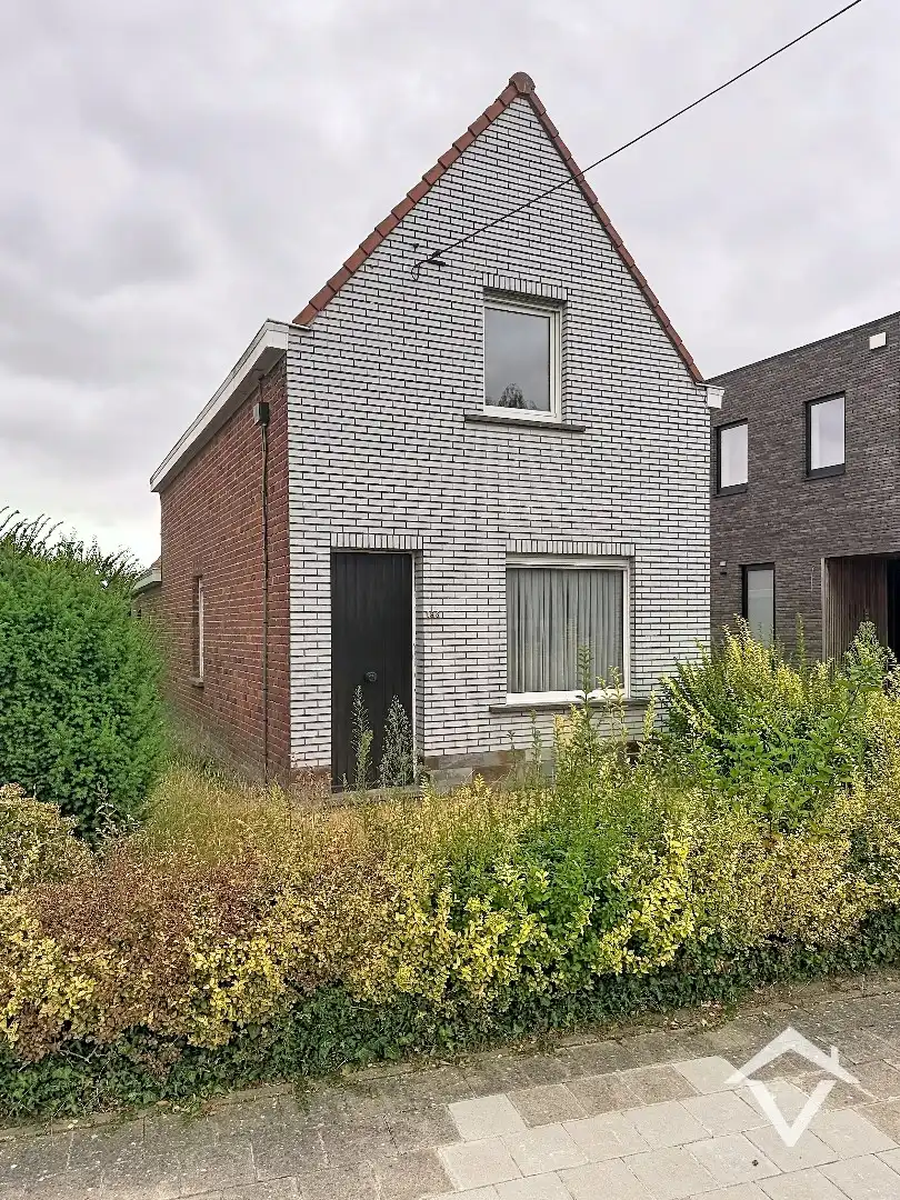 Alleenstaande woning met twee slaapkamers, tuin en garage te Roeselare foto 27