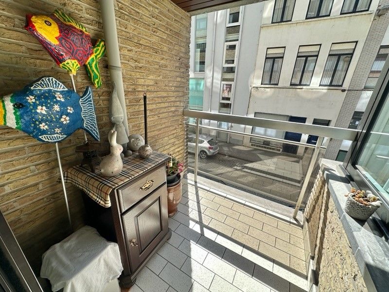 Verzorgd en heel centraal gelegen 2 slpk app. met terras foto 7