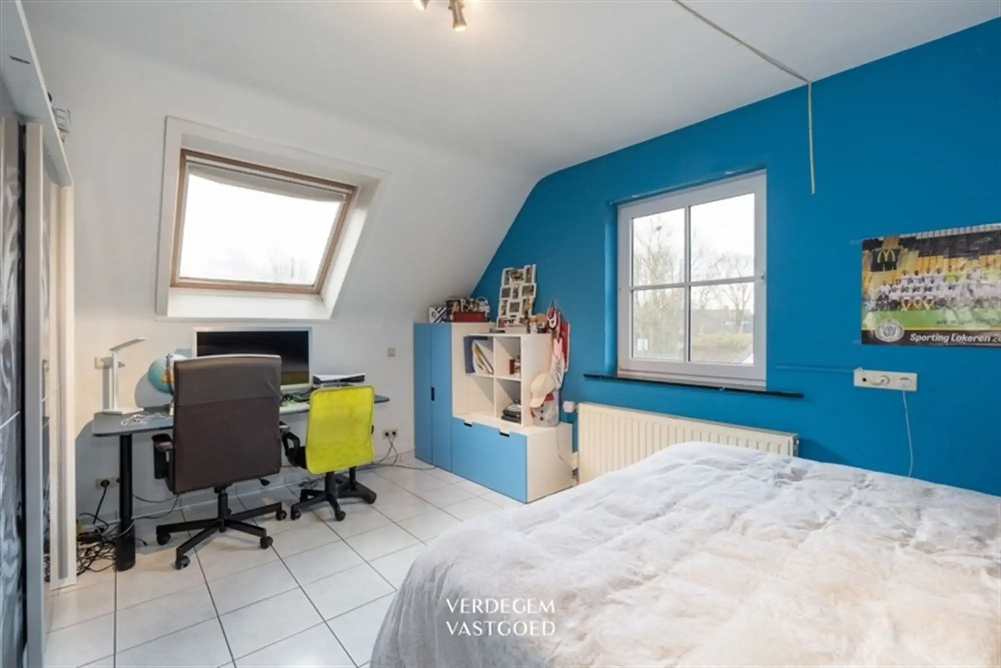 Ruime gezinswoning met 4 slaapkamers, garage en tuin in rustig straatje foto 12