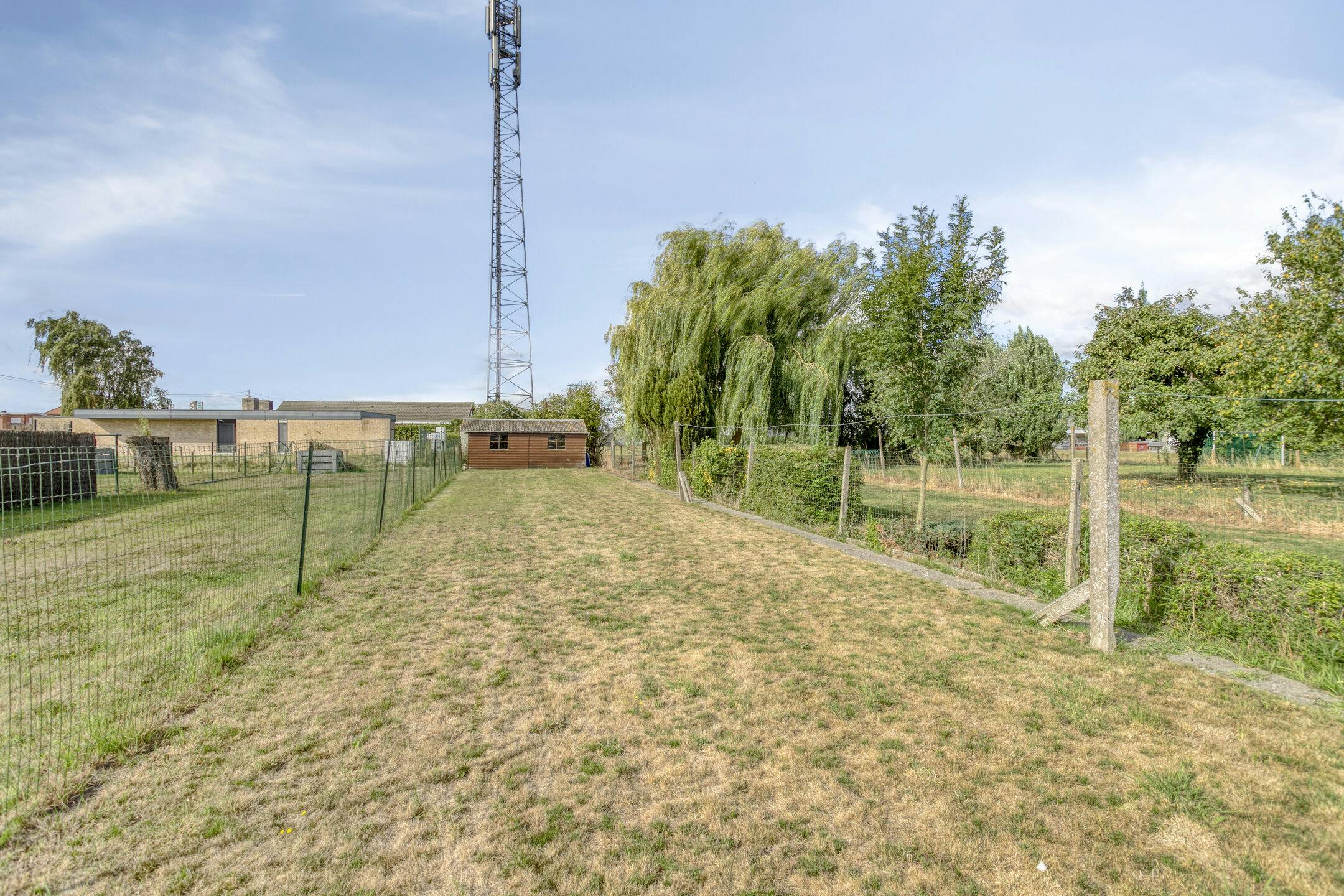 Karaktervol huis met zonnige tuin, 3 slaapkamers én garage met uitweg foto 19