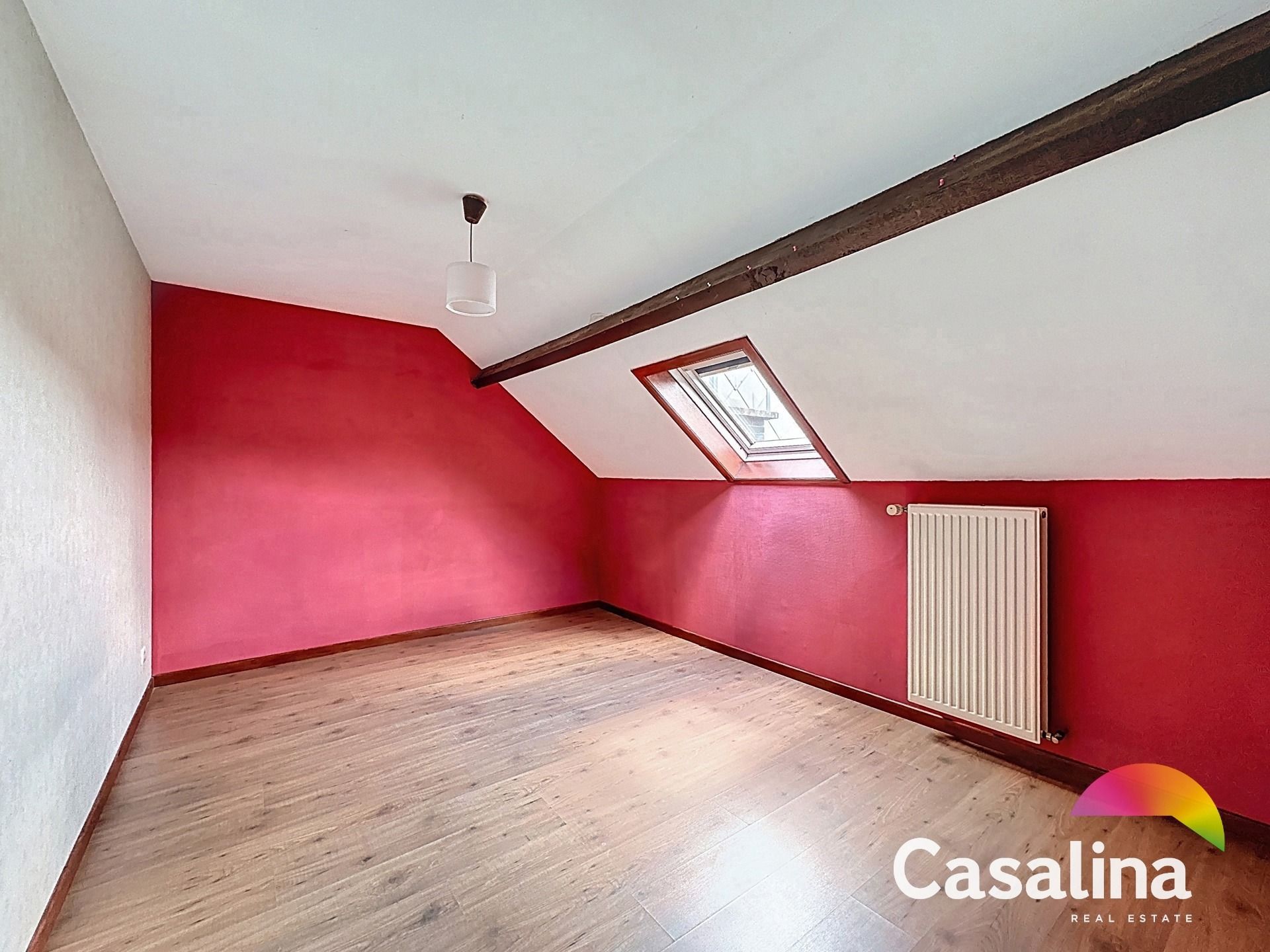 Een ruime te renoveren rijwoning van 207m² met zonnig terras foto 9