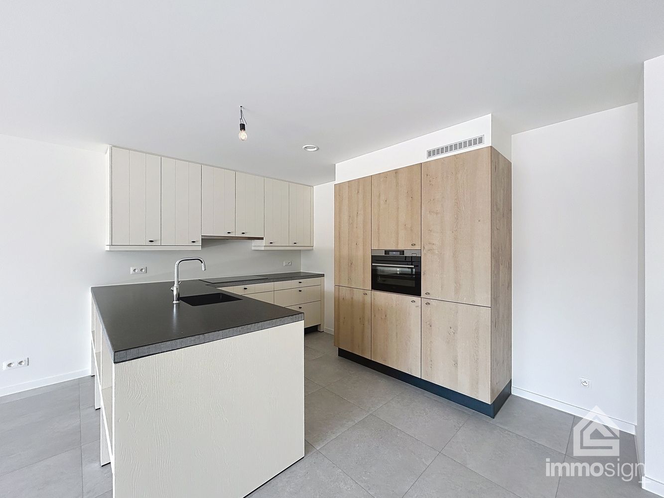 Instapklaar nieuwbouwappartement met 2 slaapkamers, terras en autostaanplaats te Kinrooi foto 9