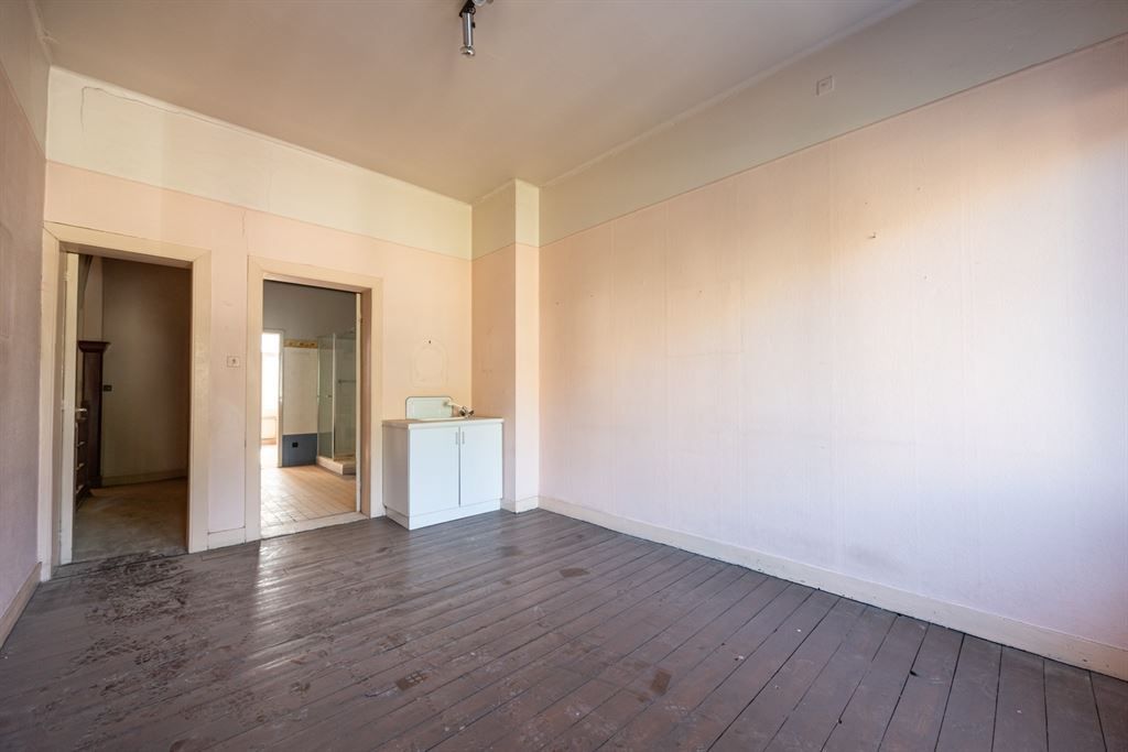 Woning met gigantisch magazijn te renoveren foto 15