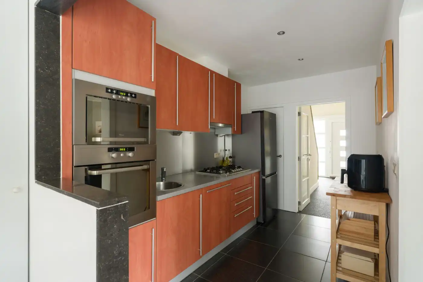 Verrassend ruime, instapklare woning met 3 slpk. en zuid-west koertje foto 9