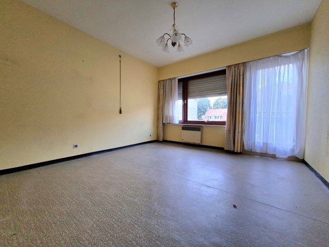 Ruime rijwoning met garage en tuin foto 9