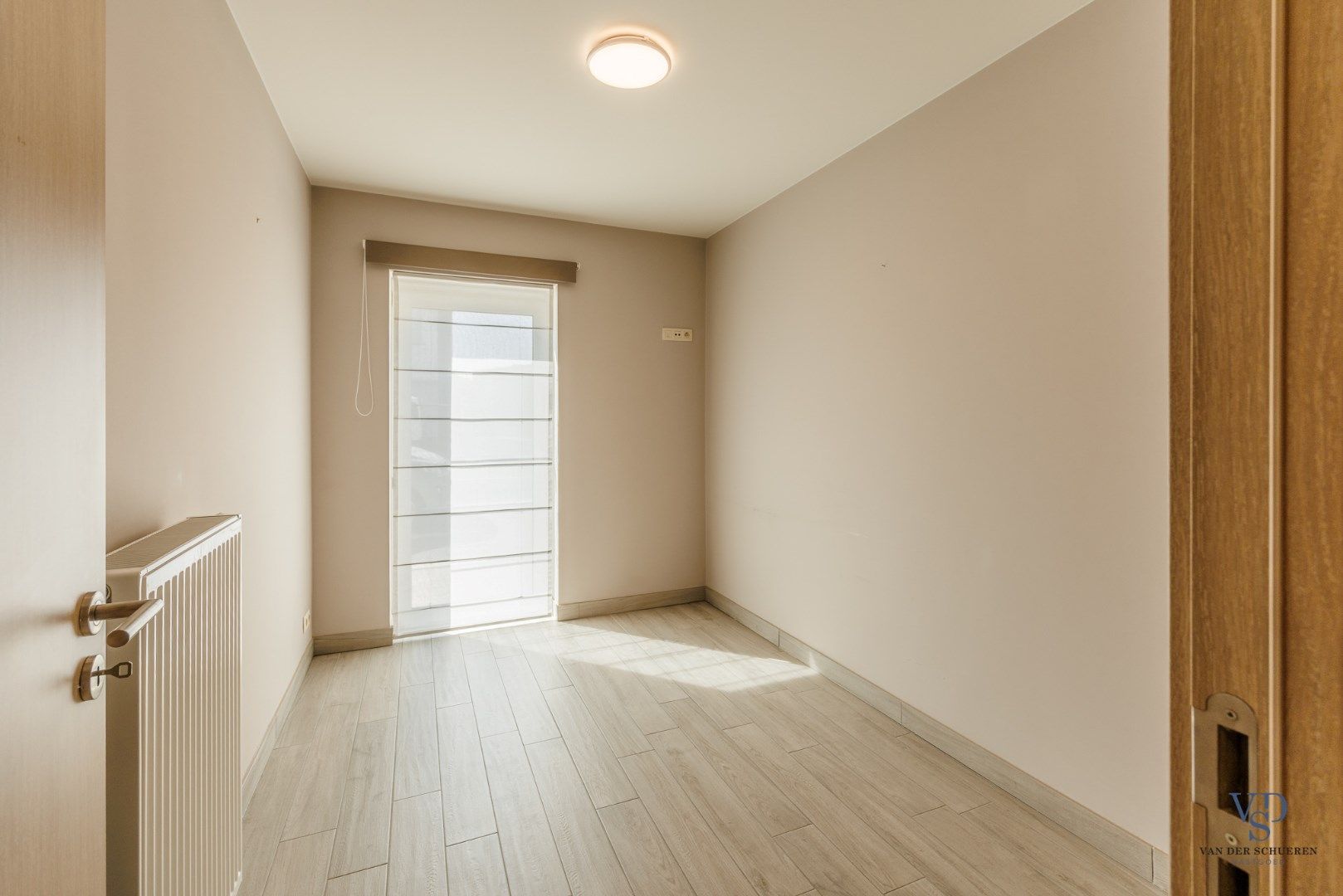 Gelijkvloers 2 slpk-appartement met terras foto 26