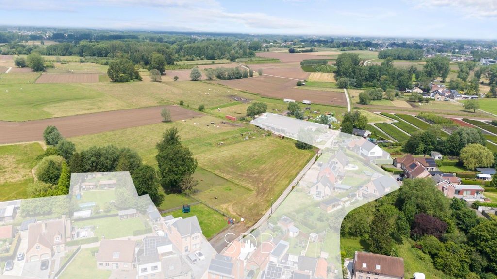 Bouwgrond met gezinstuin en aanpalend grasland op 7.598m² foto 2