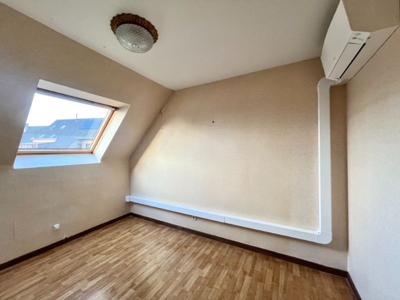 RIJWONING MET TUINTJE EN GARAGE GELEGEN IN DE DORPSKERN VAN SLEIDINGE foto 7