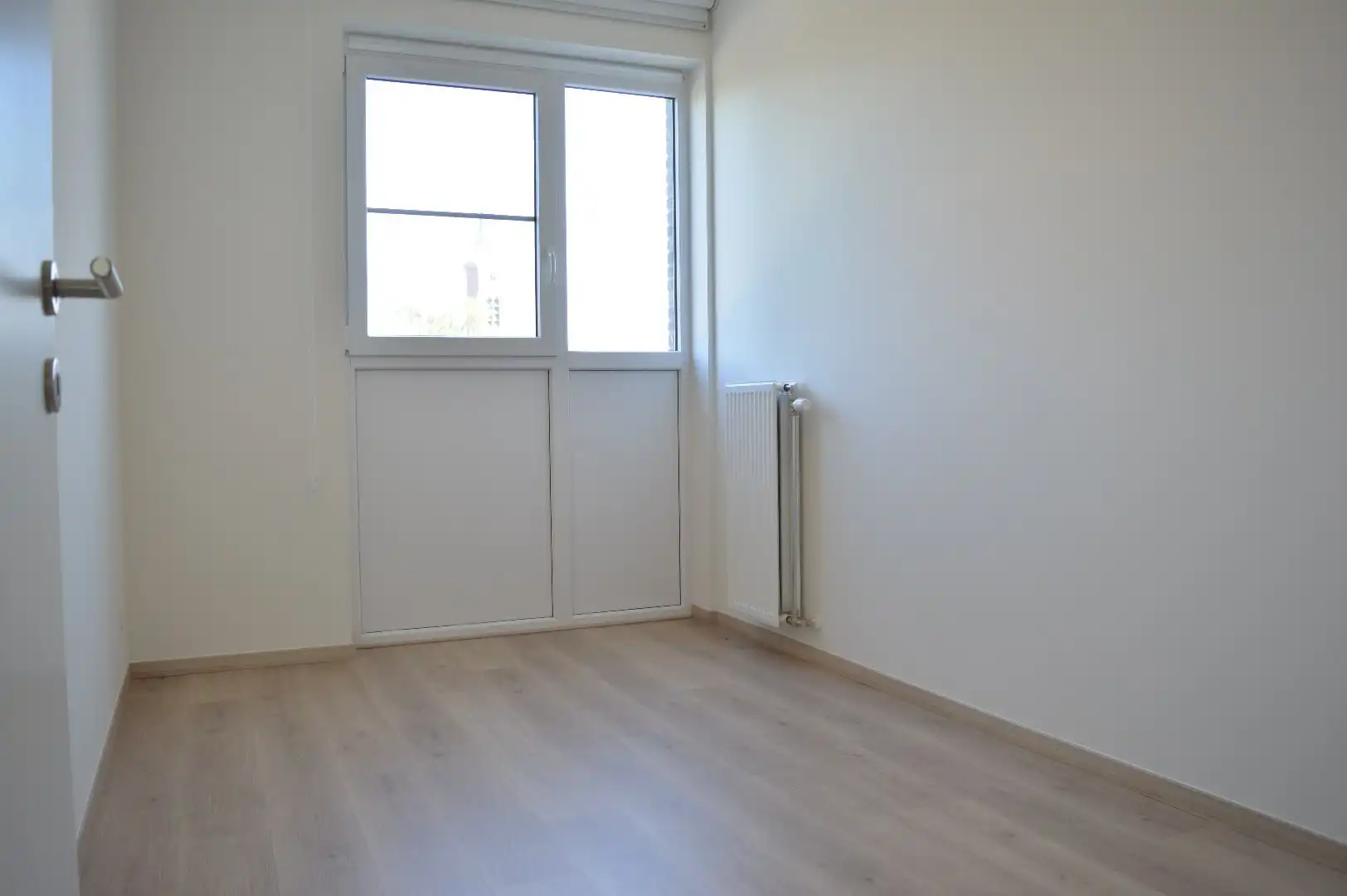 Recent 2-slaapkamerappartement met ondergrondse autostandplaats in het centrum van Gullegem foto 6