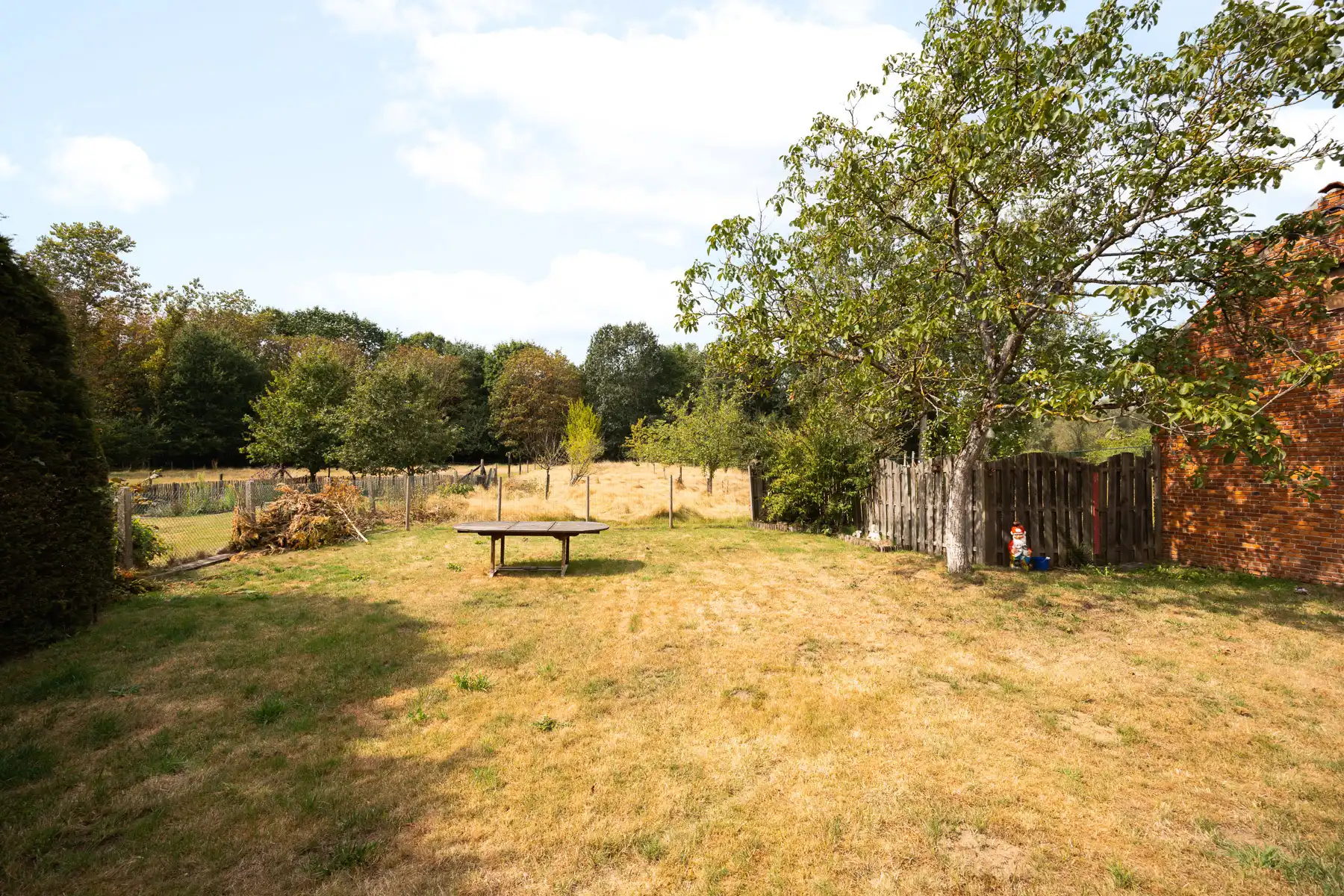 Prachtig groen gelegen renovatiewoning met prachtige tuin foto 20