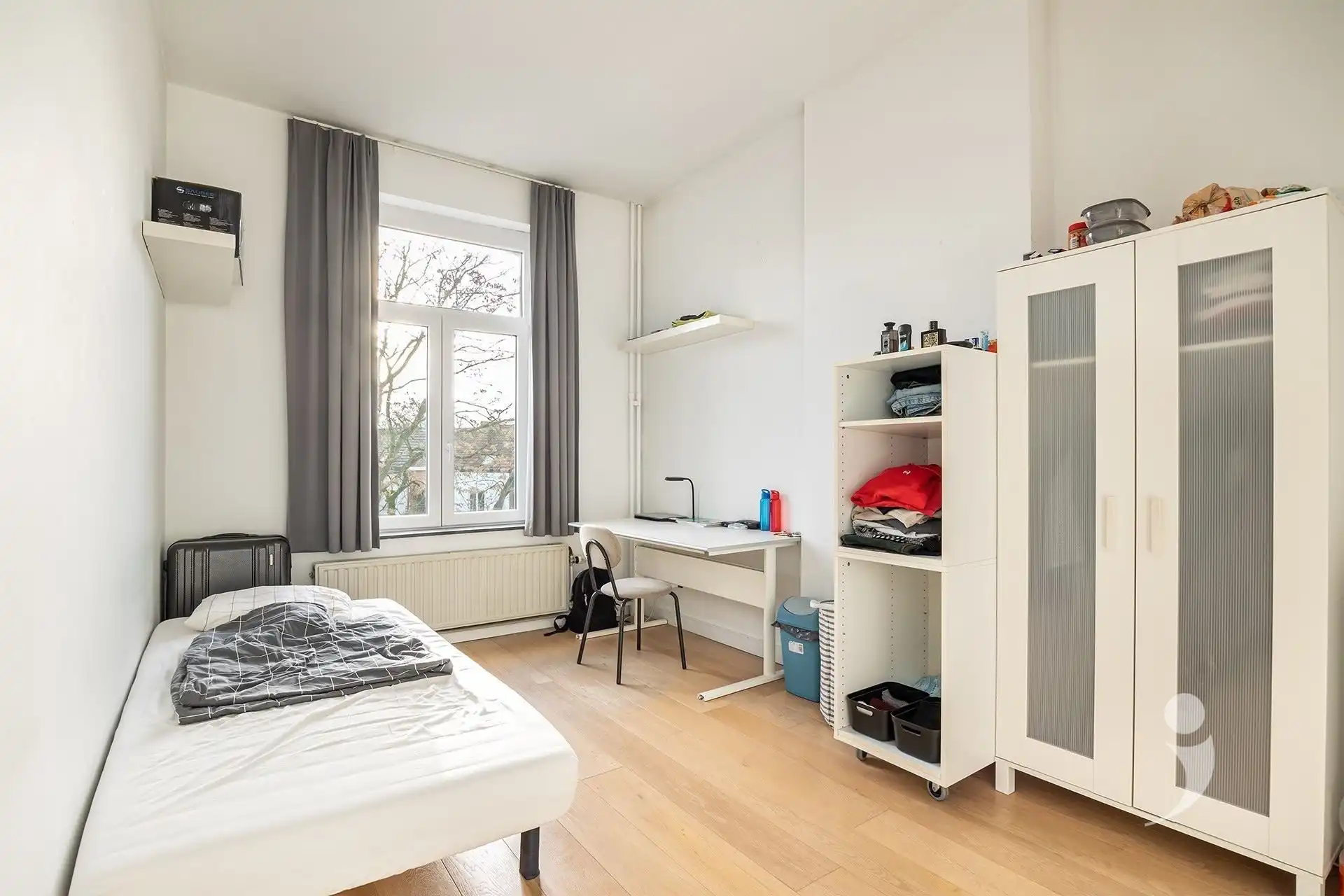 Opbrengsteigendom met handelspand, studio en 6 studentenkamers in Leuven foto 3