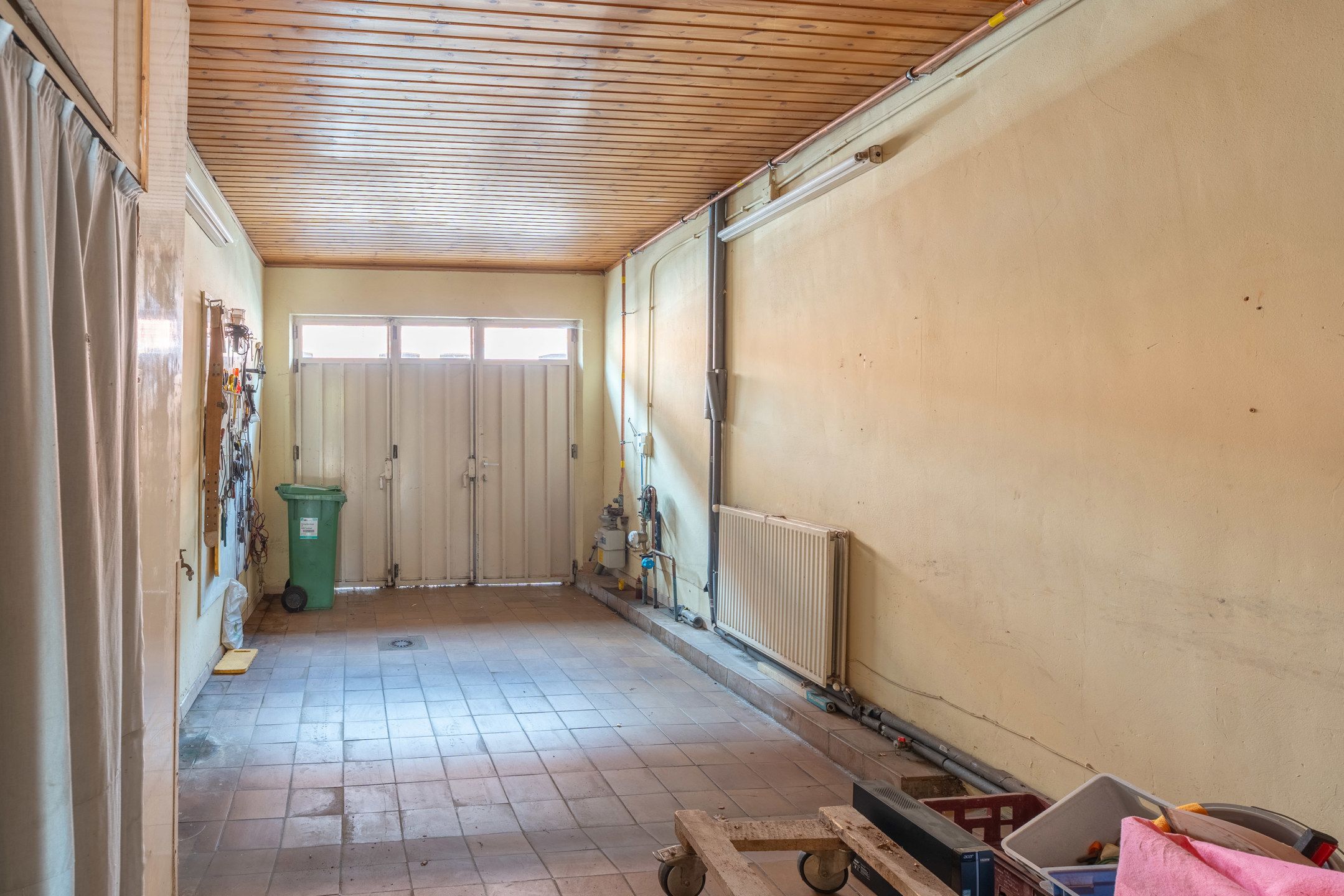 Te renoveren woning met toffe tuin en garage in het centrum foto 16
