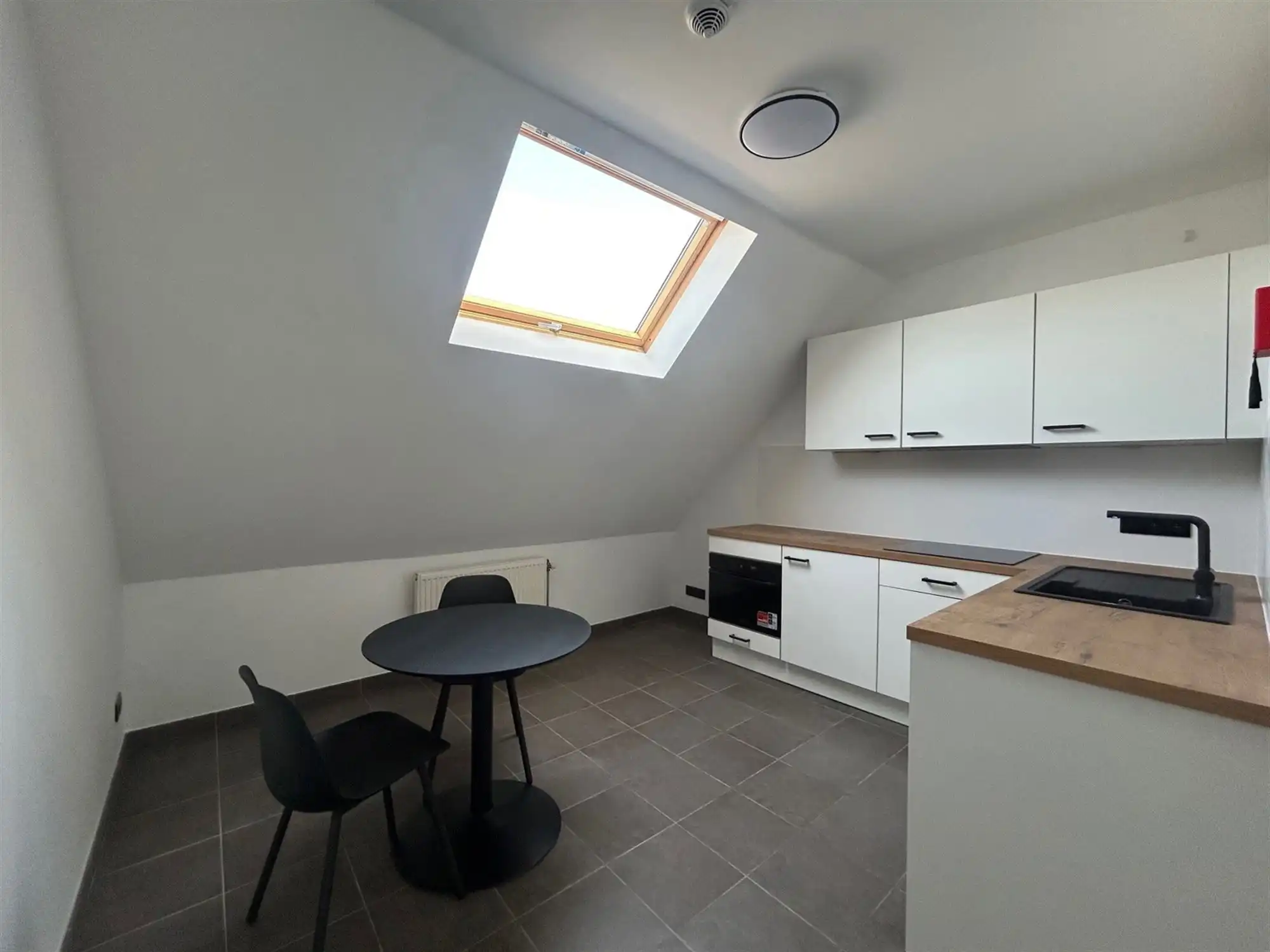 Zeer ruime studio (32m²) Tiensestraat Leuven foto 2